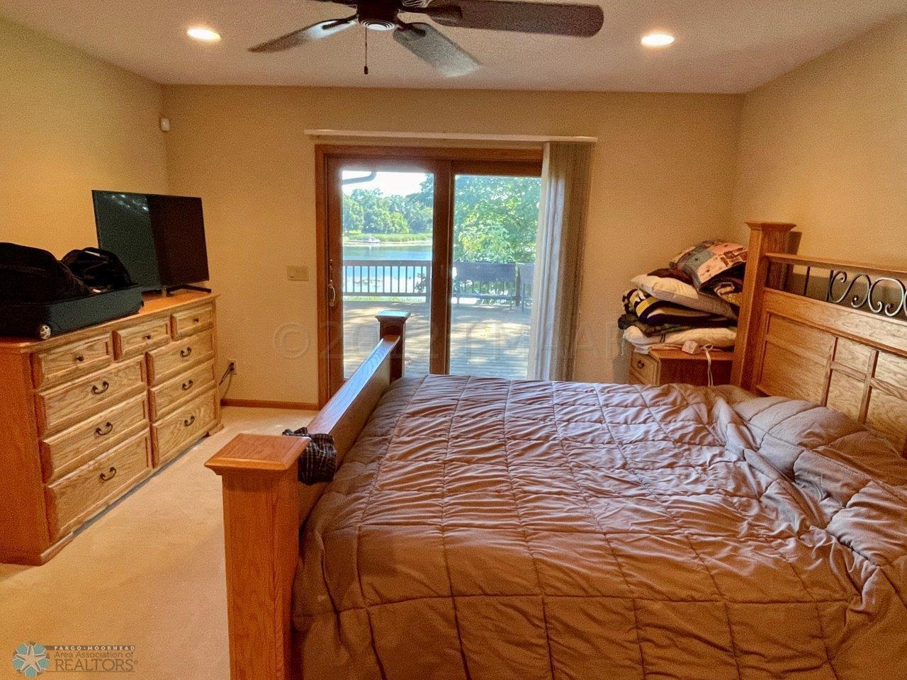 7-Primary bedroom walks out to lakeside