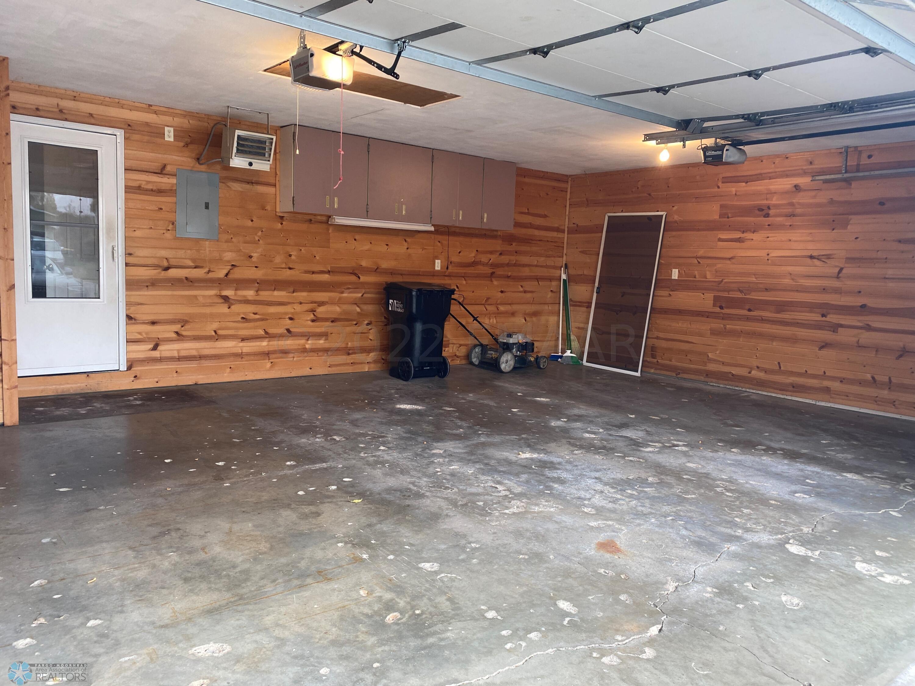 3 stall Heated Garage