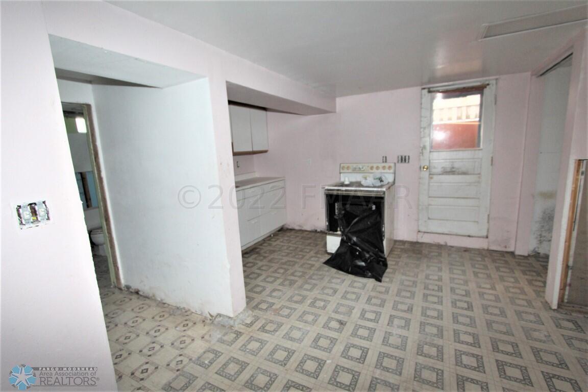 BASEMENT KITCHEN AND BASEMENT ENTRY DOOR