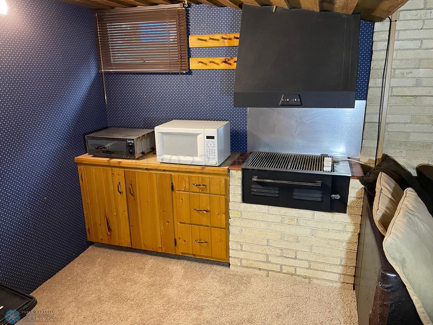 Basement-family-room-view-3-indoor-grill