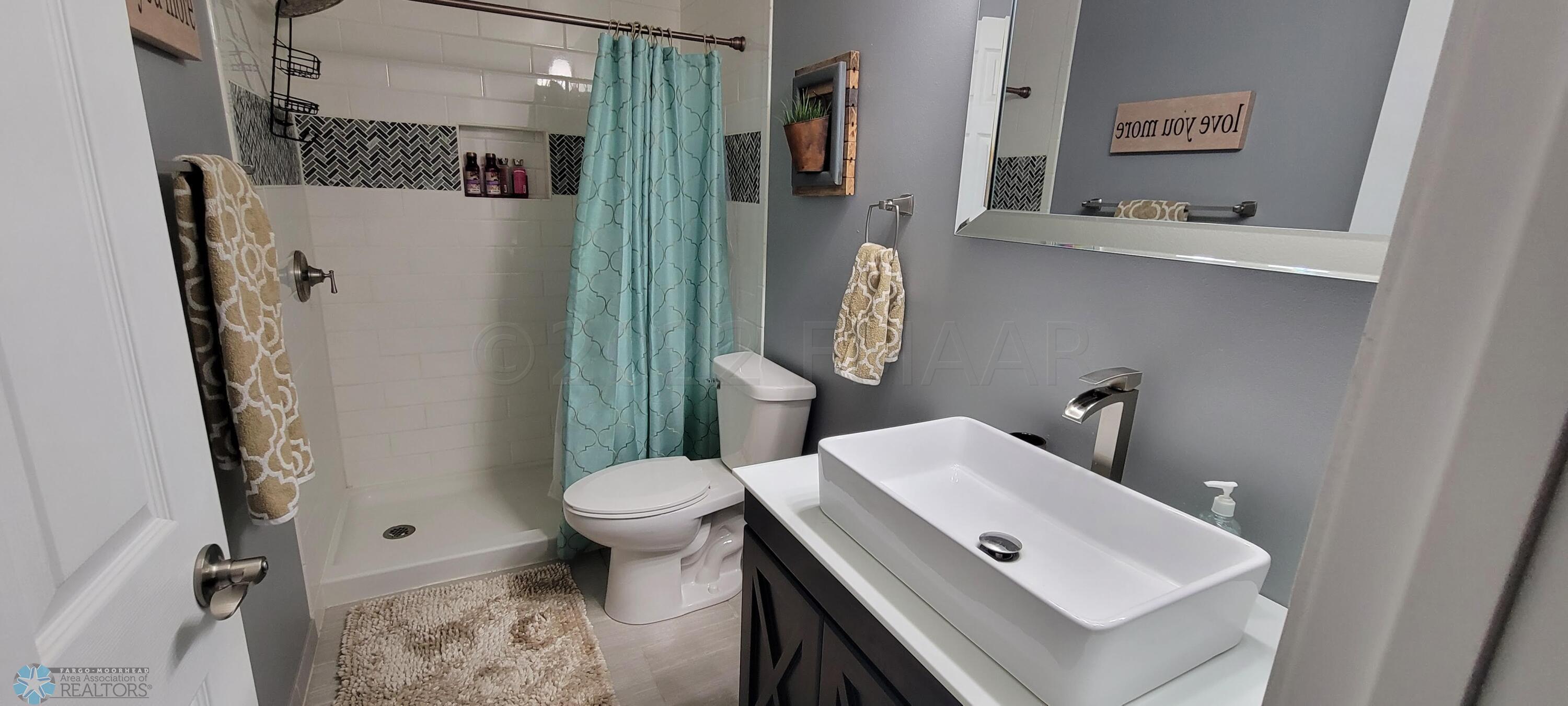 Bsmt. bath w/ tile shower