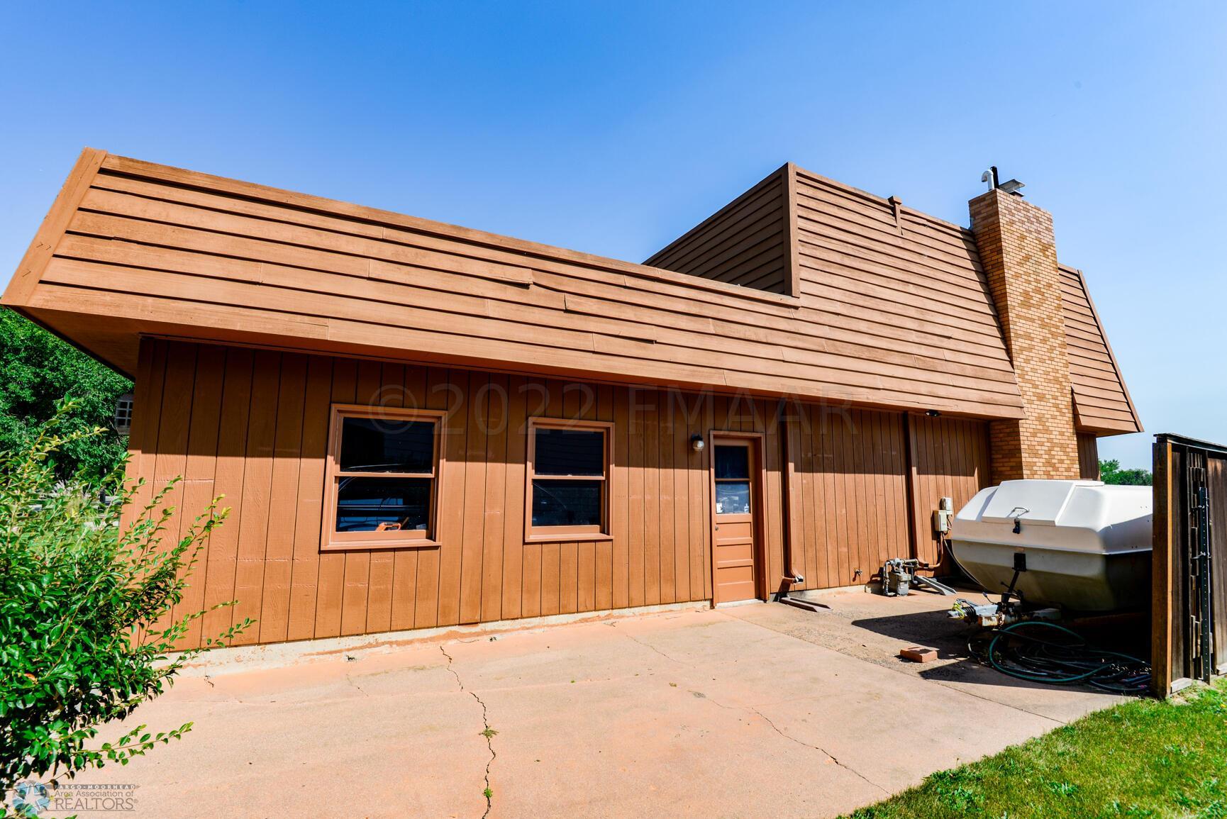 Side Exterior + Parking Slab