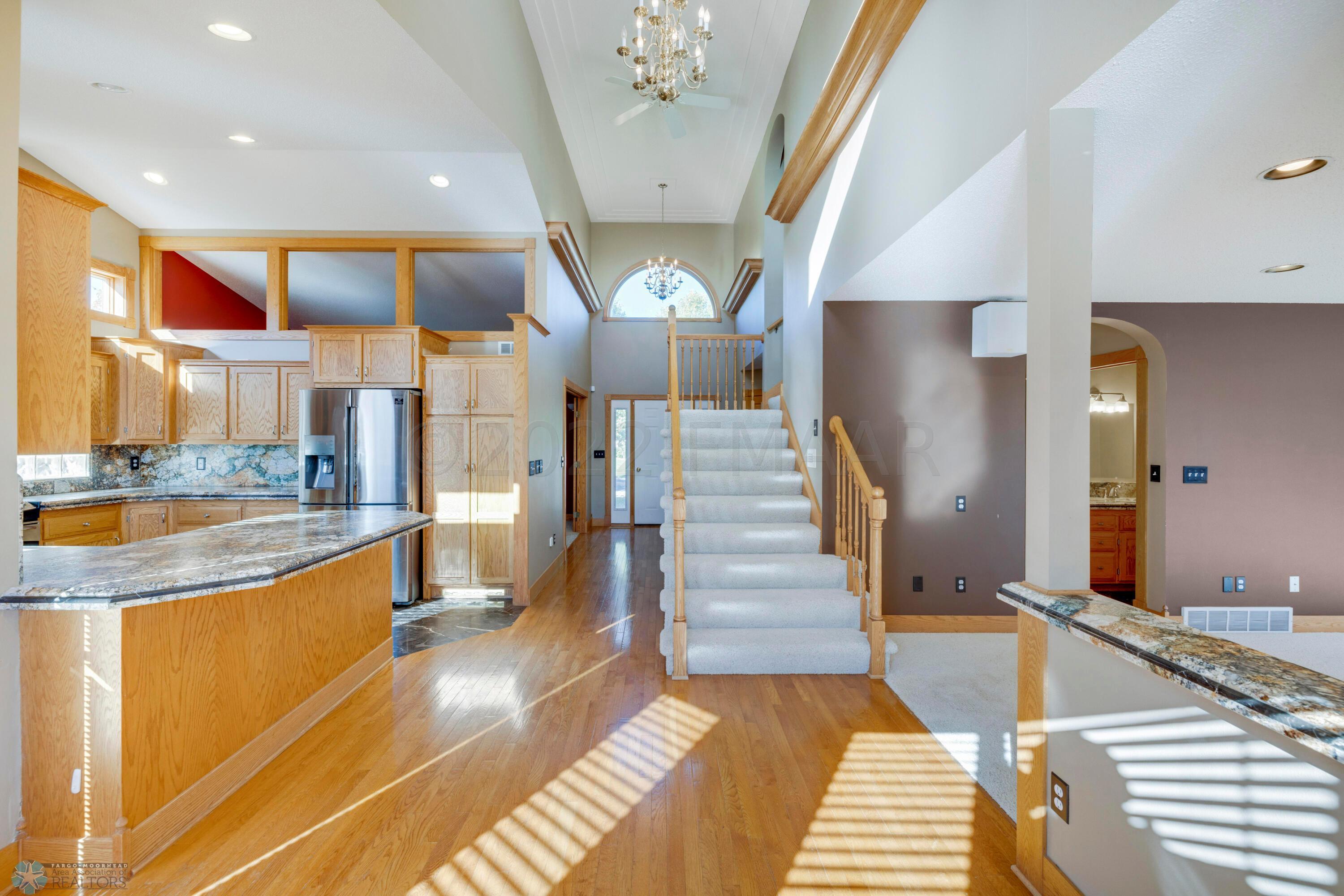 Dining, Kitchen & Front Foyer Area