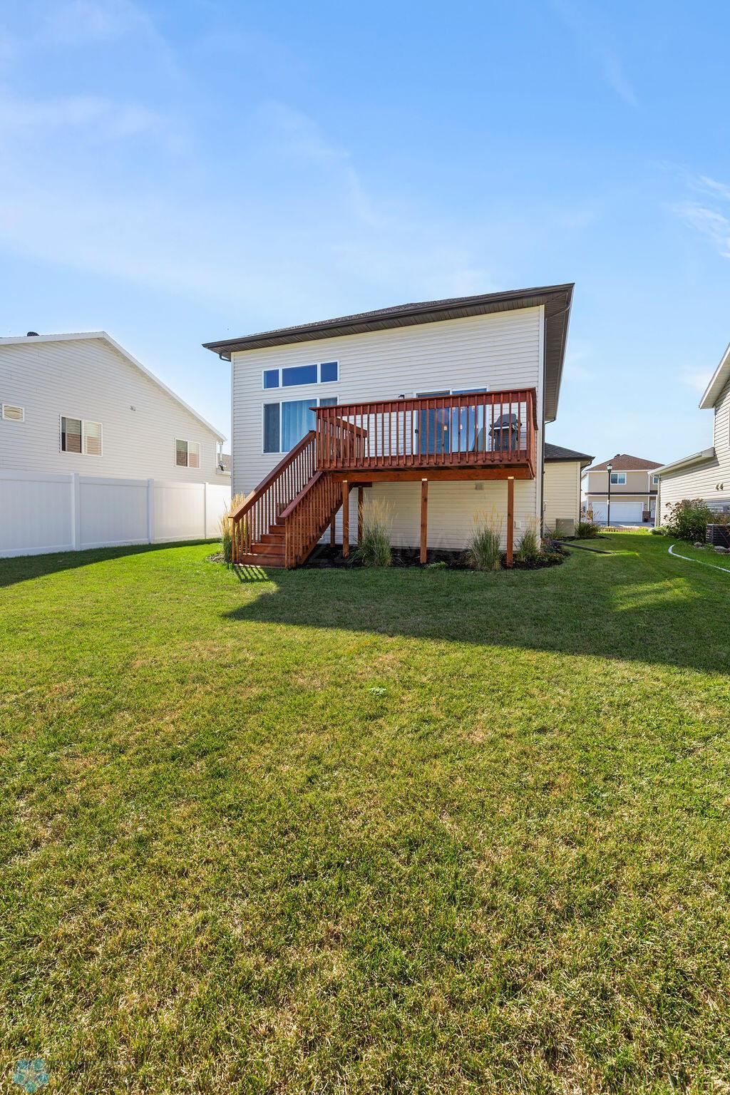 Back of home + yard