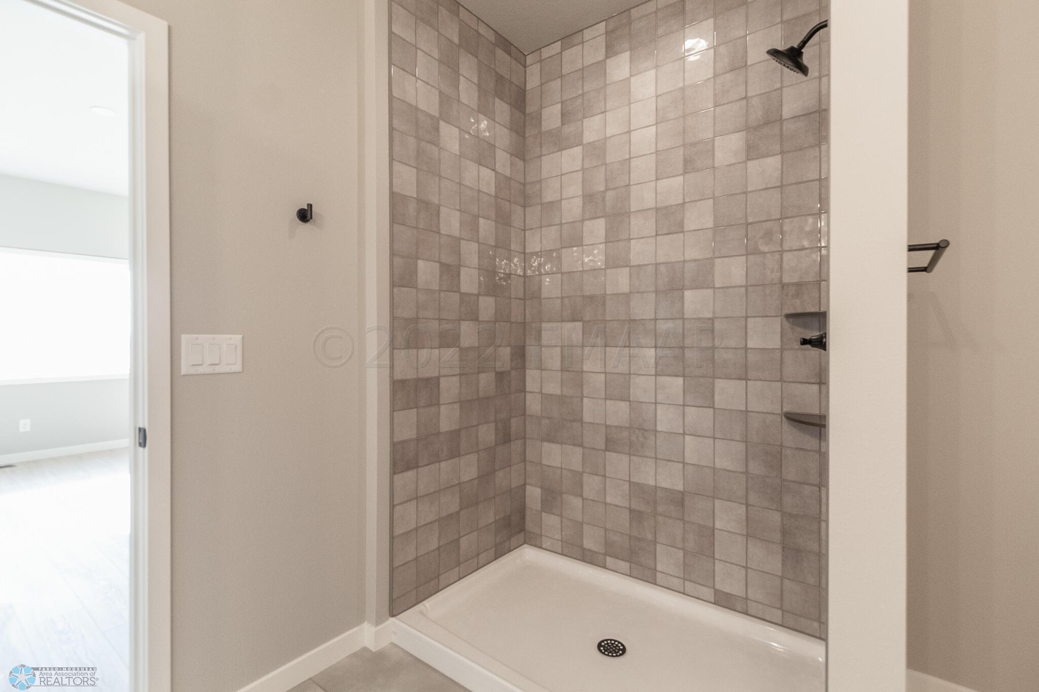 Photos are of a previous model.