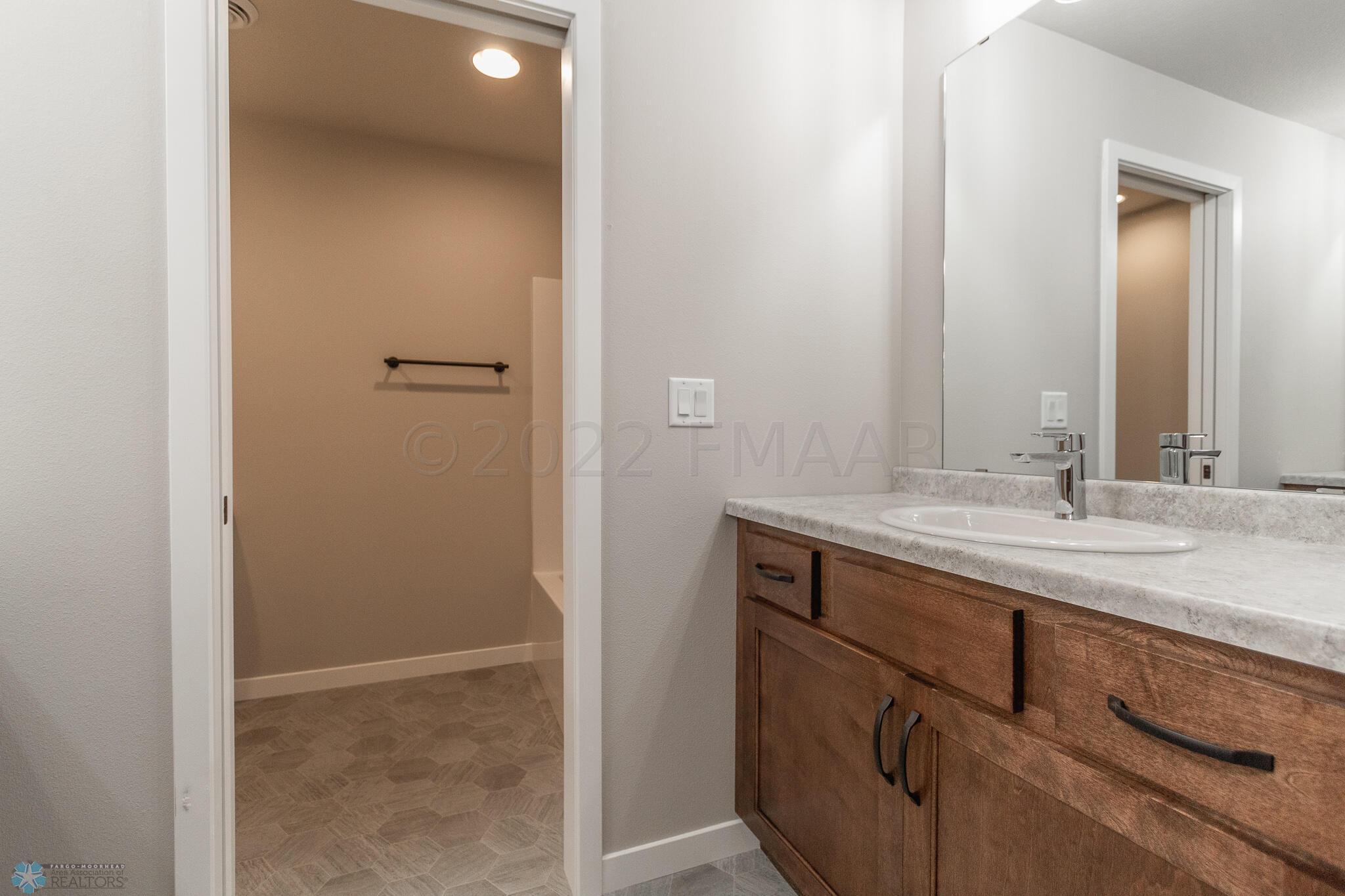 Photos are of a previous model.