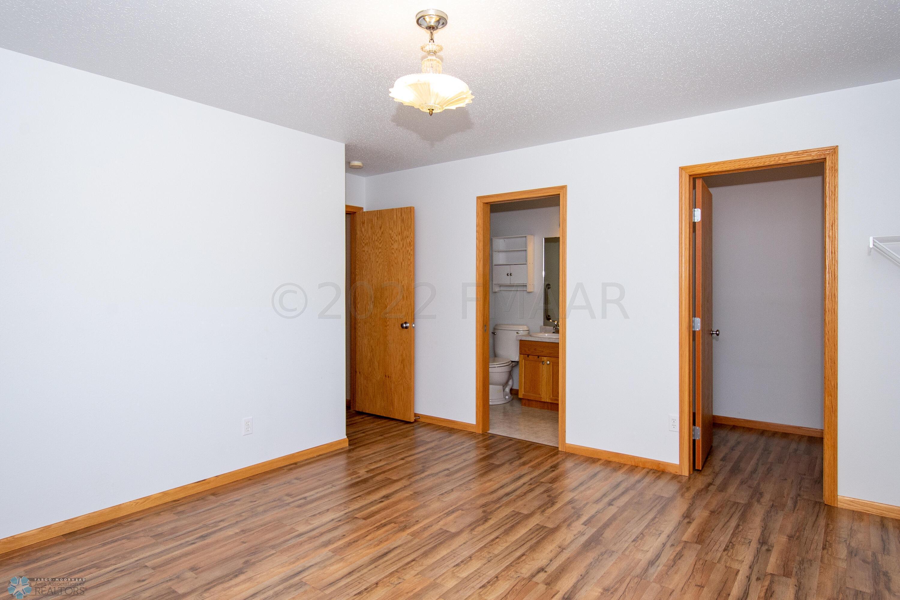 Primary into bathroom and closet