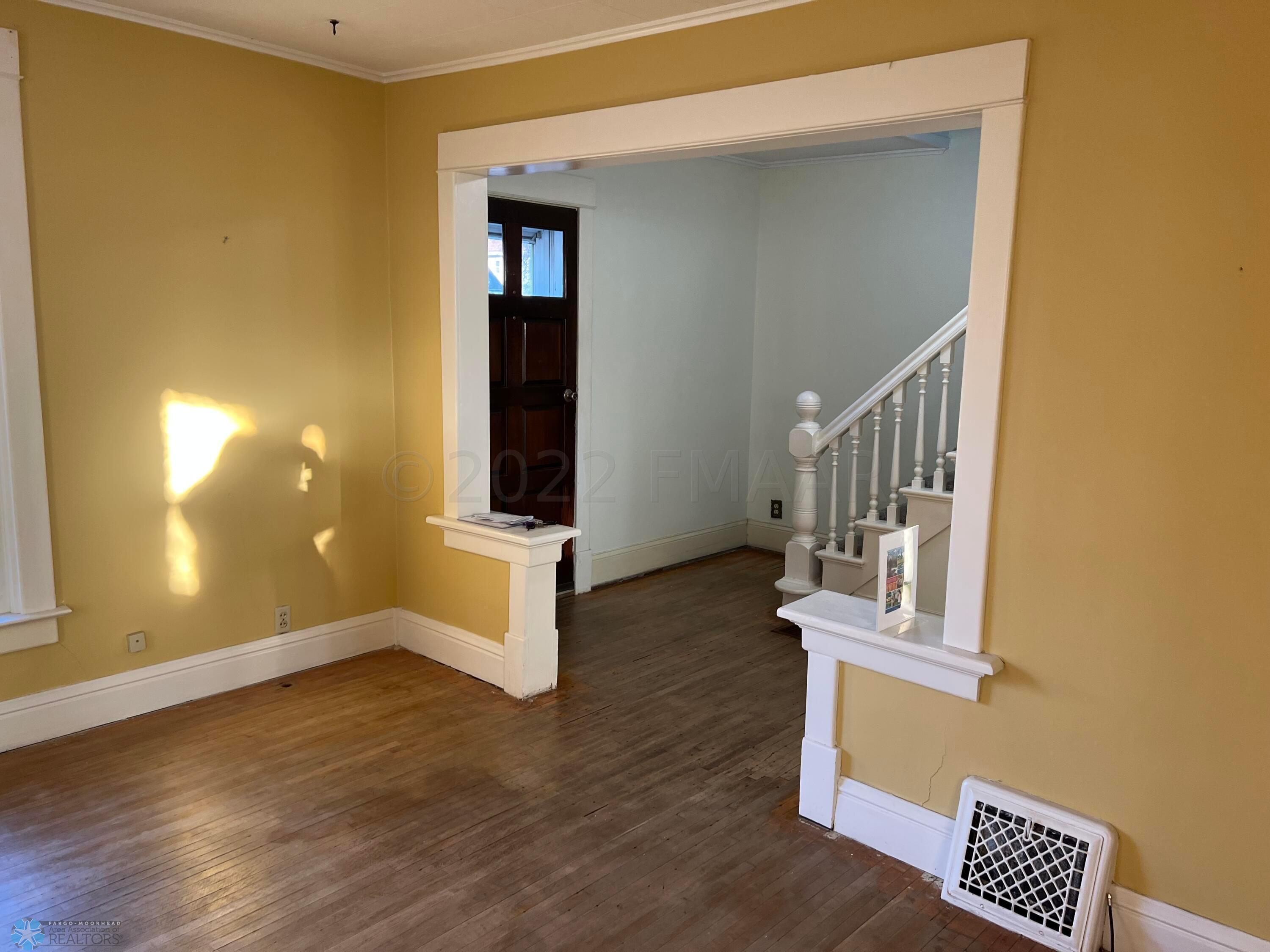 Living room to front entry