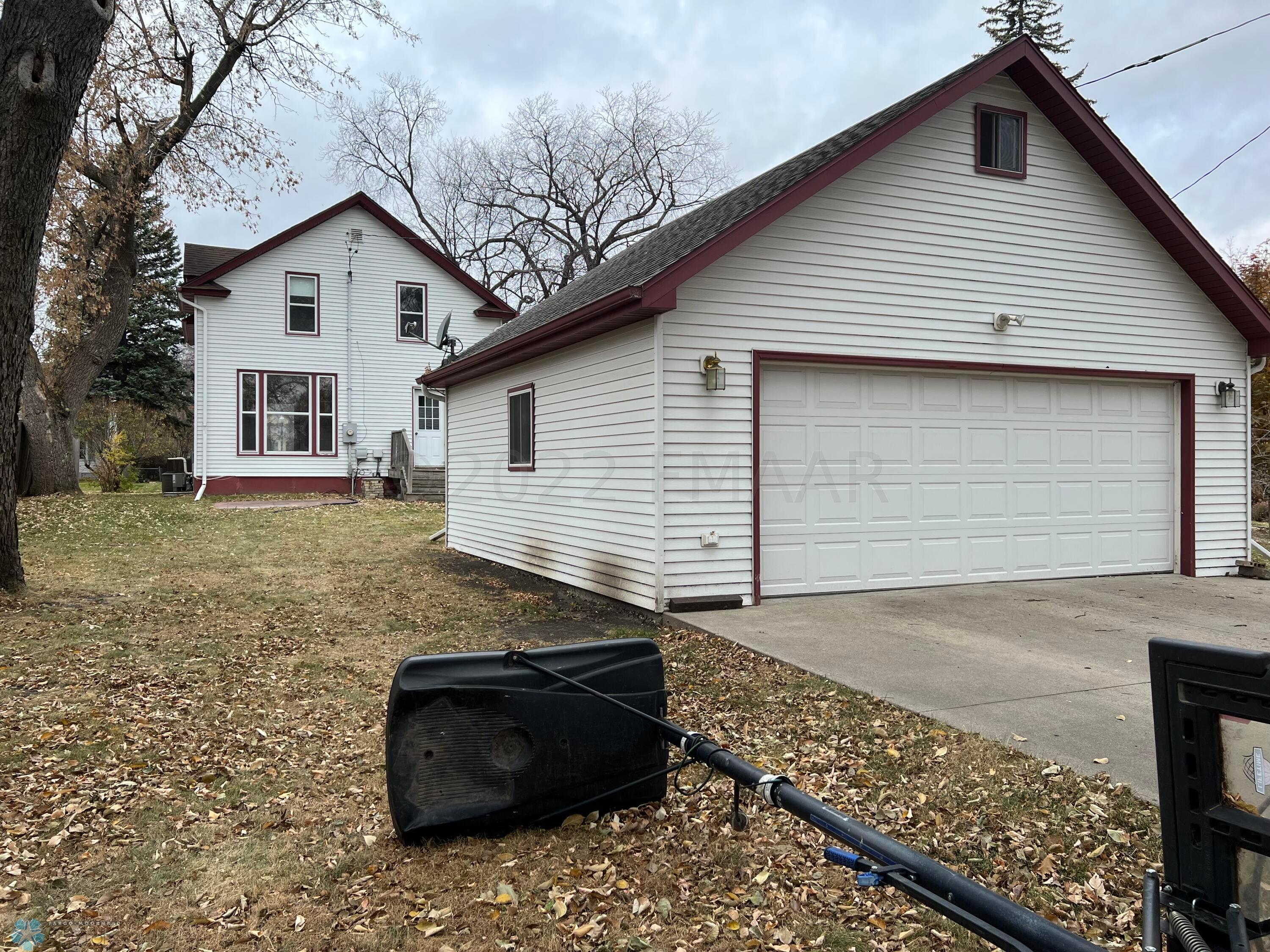 yard, garage and back of home