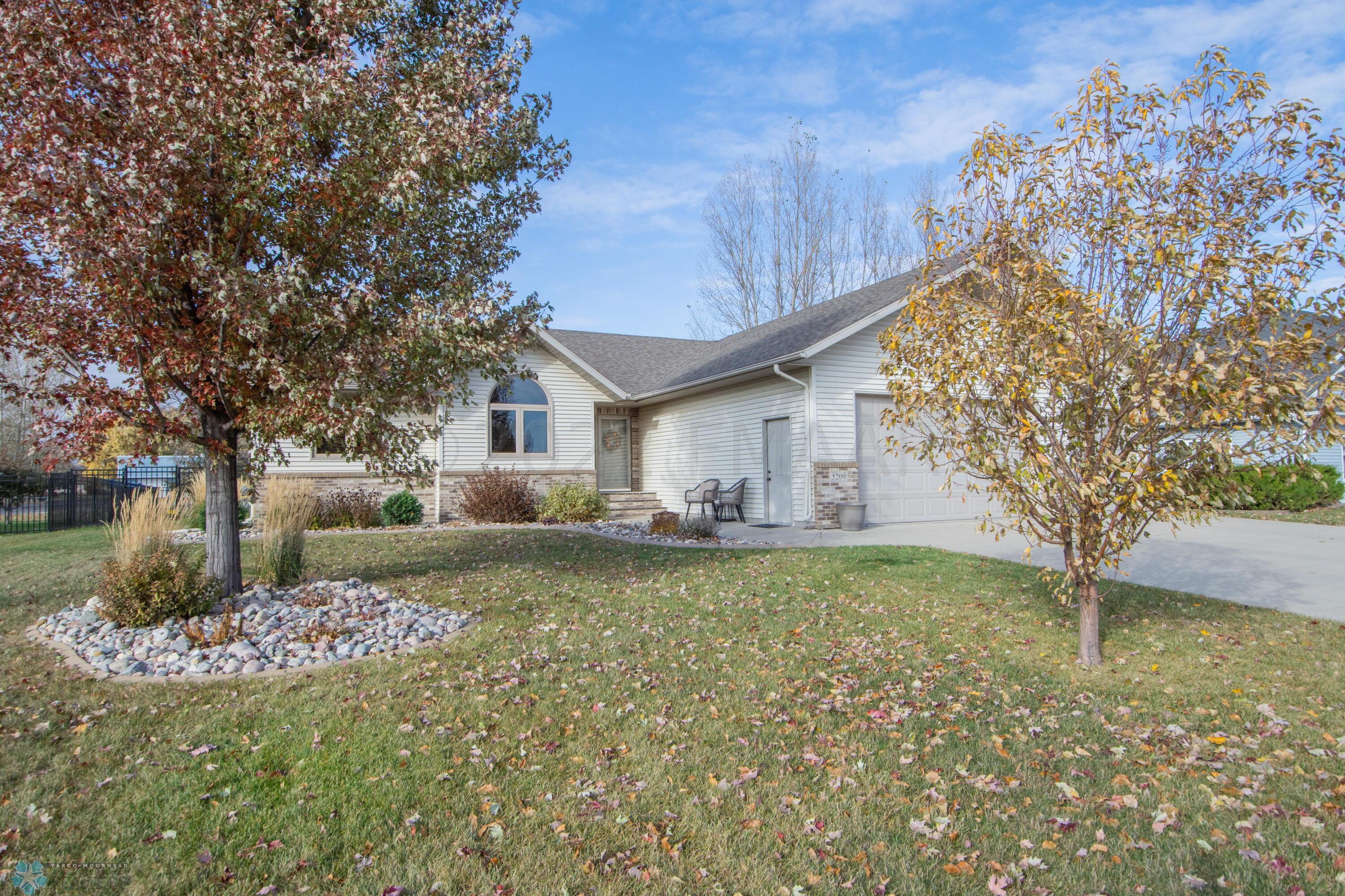Landscaped yard with trees