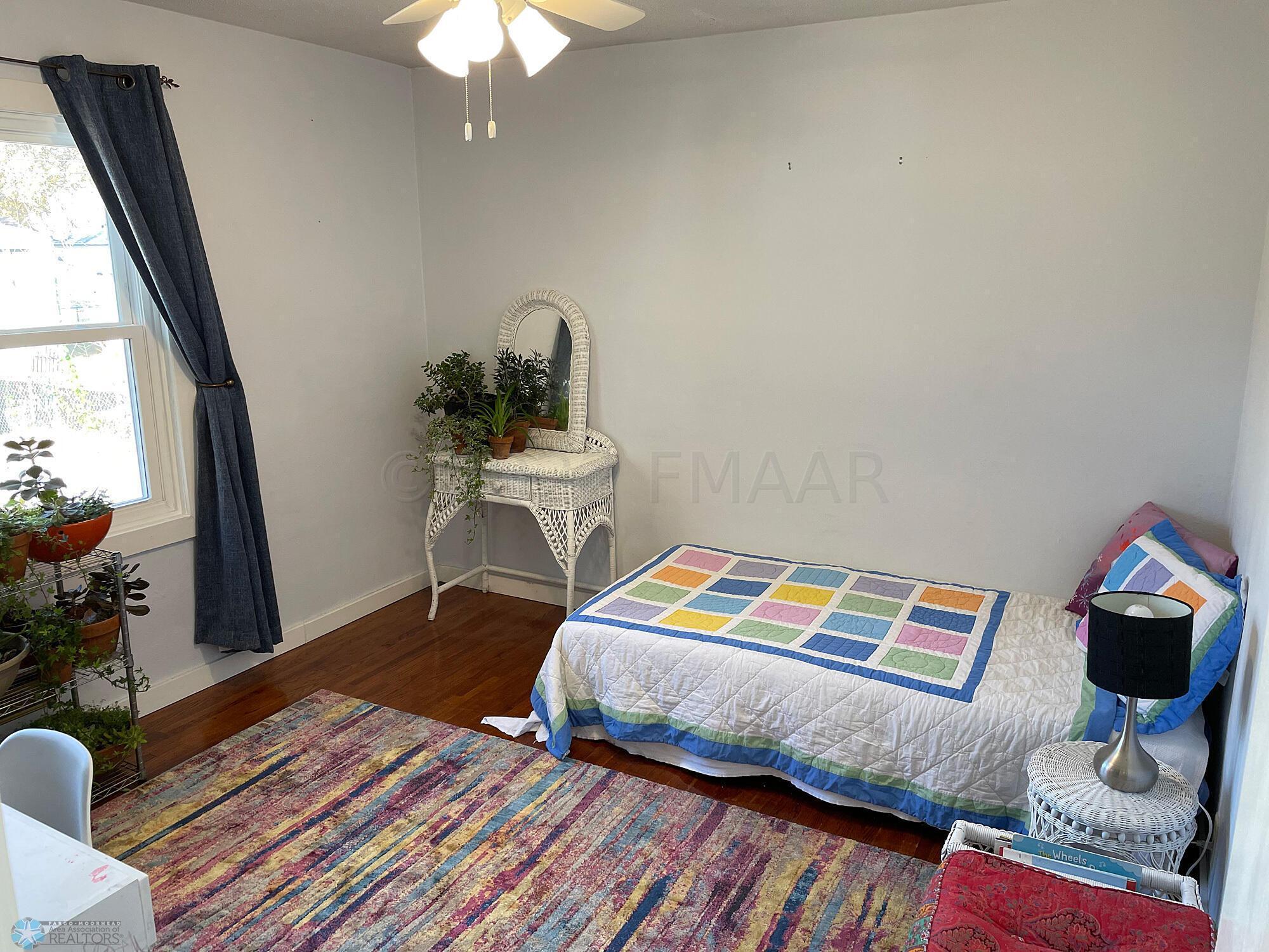 Bedroom 1 with oak floor-view 1