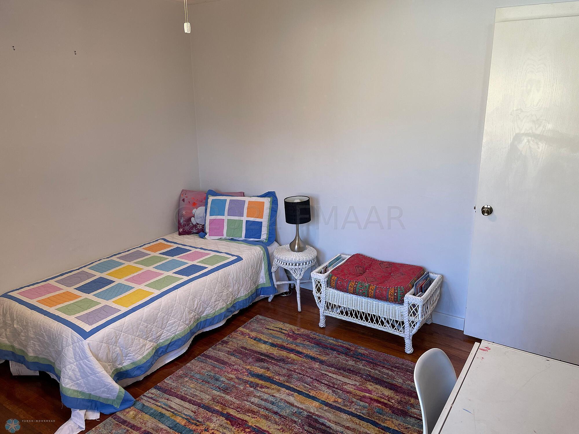 Bedroom 1 with oak floor-view 2