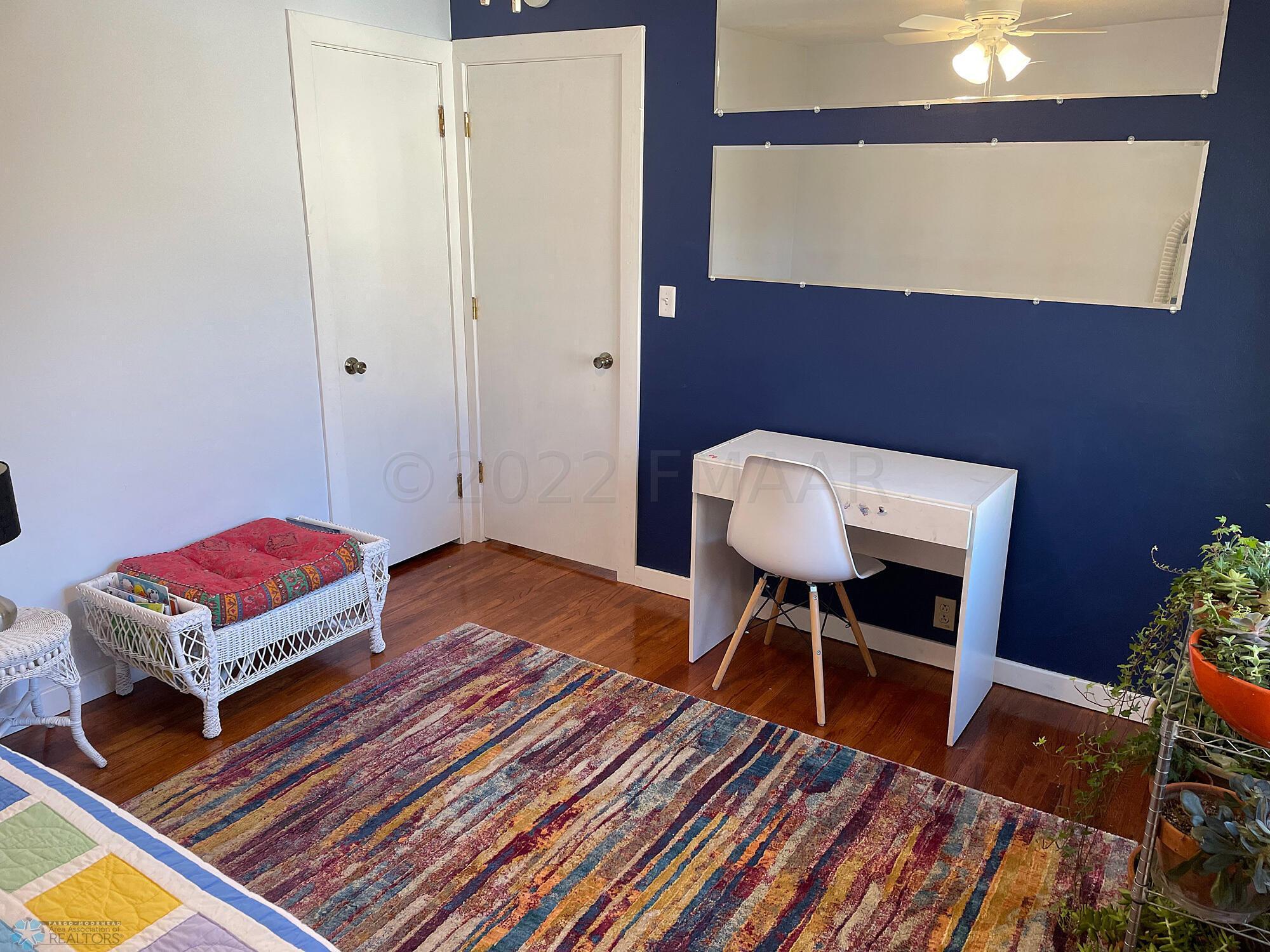 Bedroom 1 with oak floor-view 3