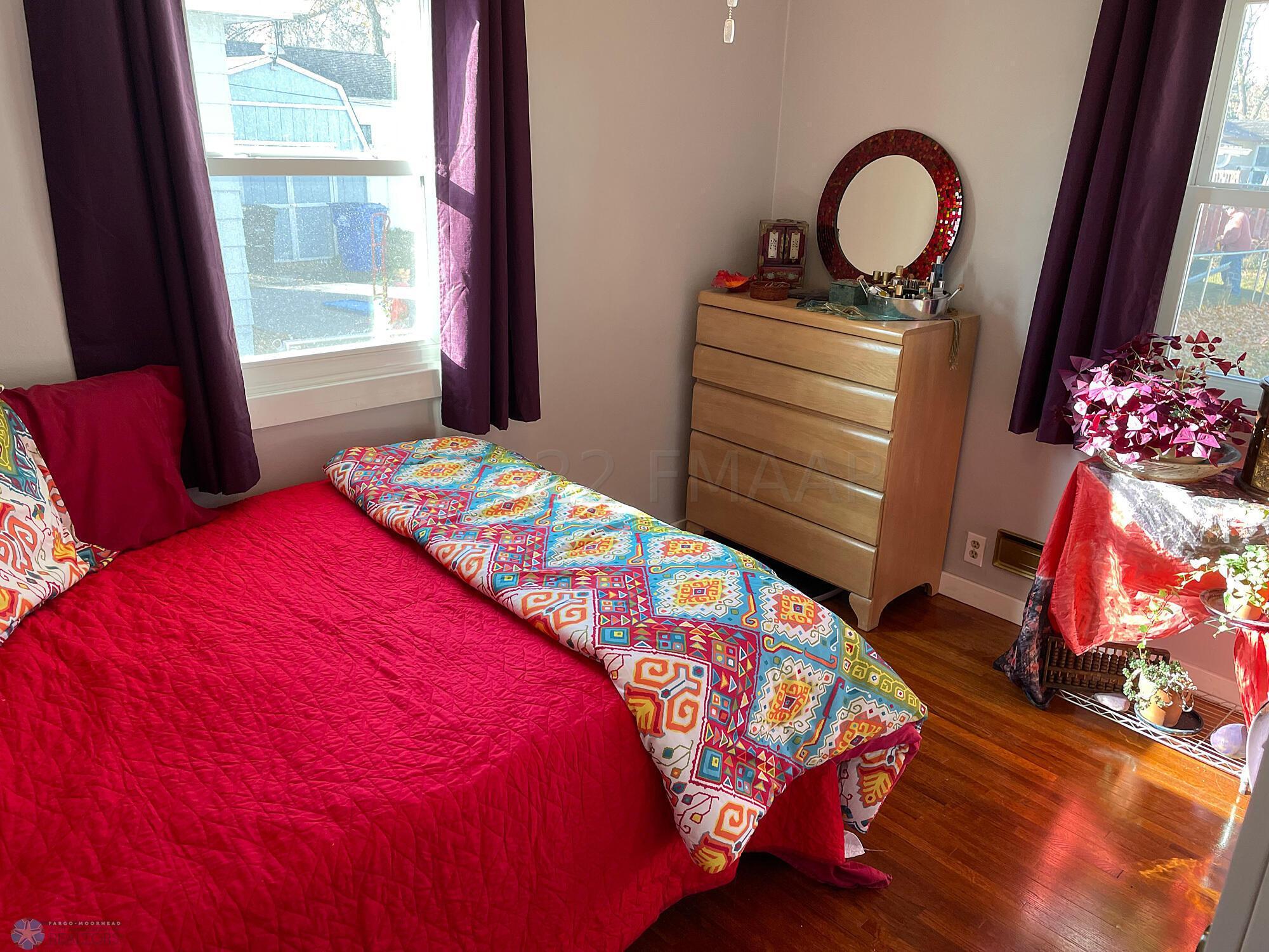 Bedroom 2 with oak floor-view 1