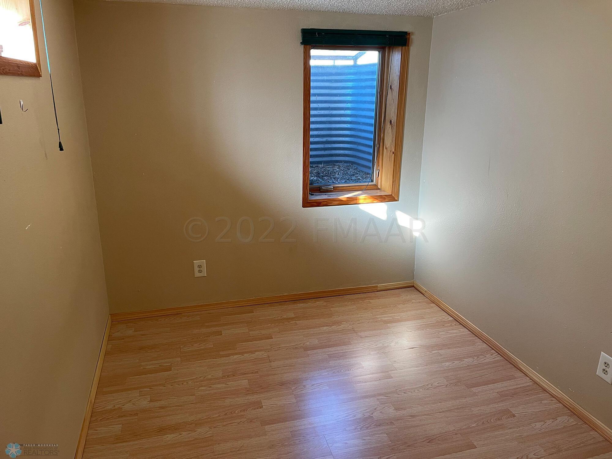 Bedroom 3. Egress. Laminate floor 2018.