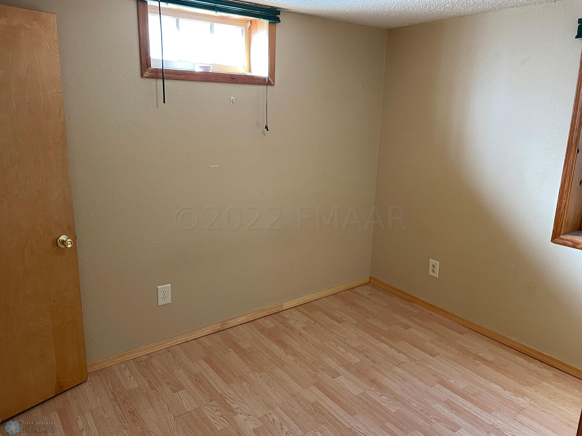 Bedroom 3. Egress. Laminate floor 2018.