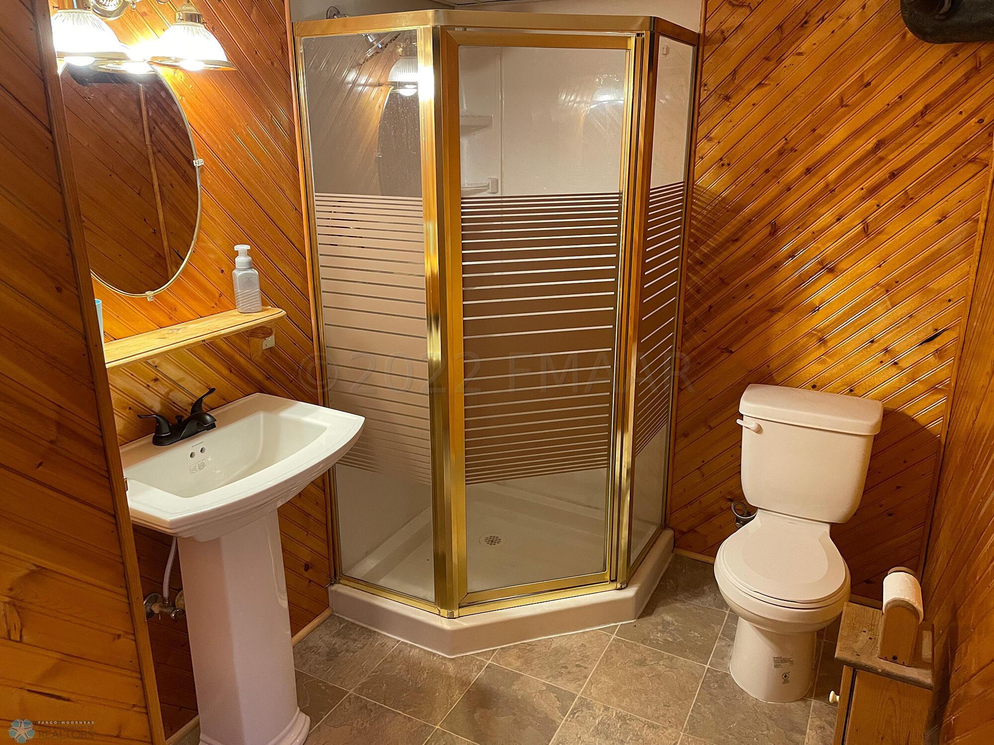 3/4 bath. New sink, faucet, toilet.