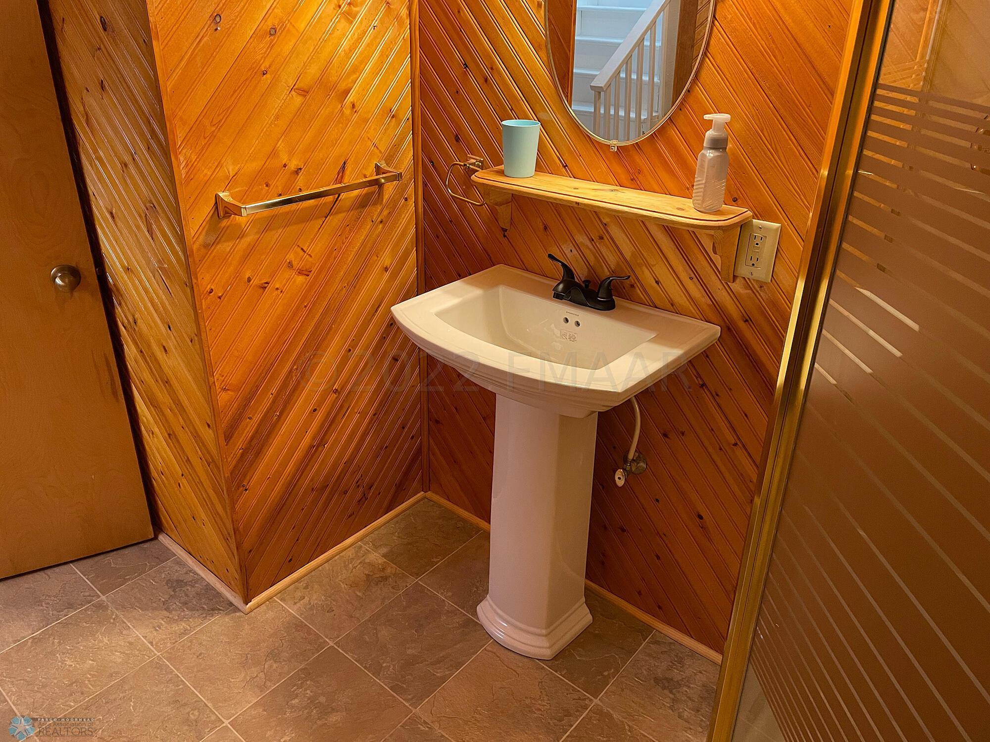 3/4 bath. New sink, faucet, toilet.