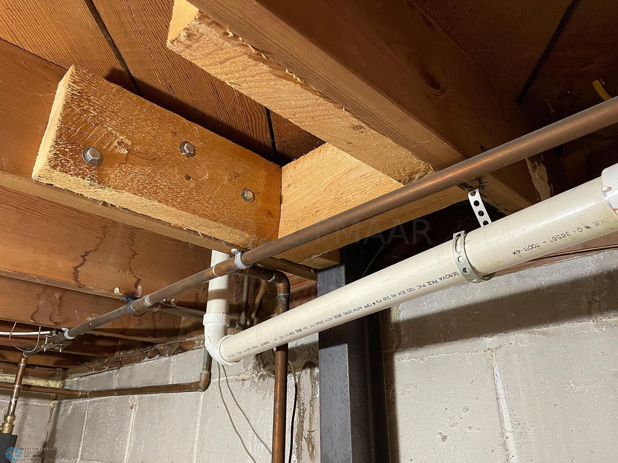 Steel I-beam bracing in the basement