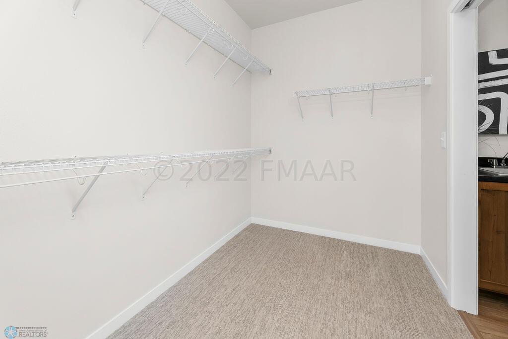 19. Primary bedroom closet