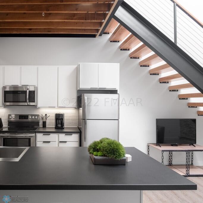 Kitchen under loft area