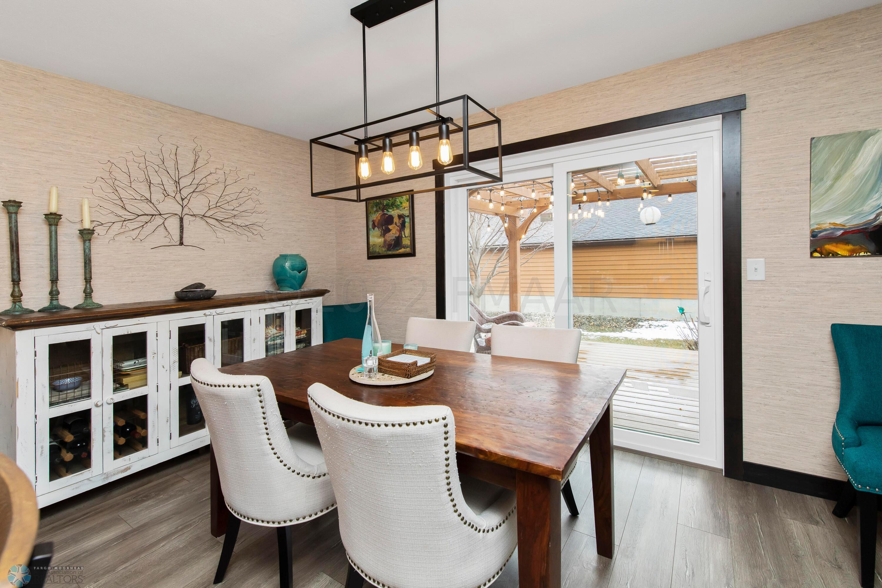 Dining with patio doors to deck