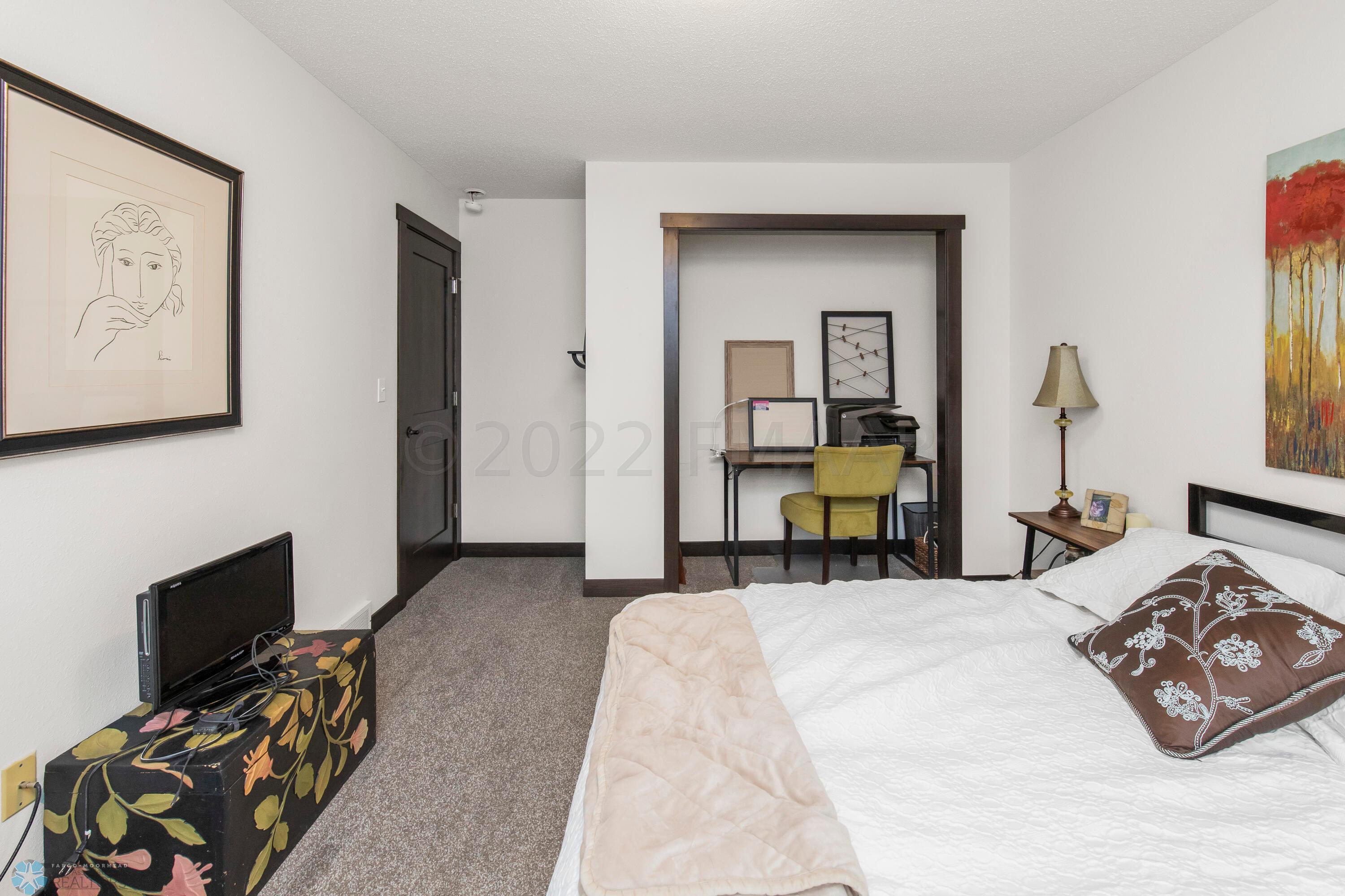 Bedroom with office space