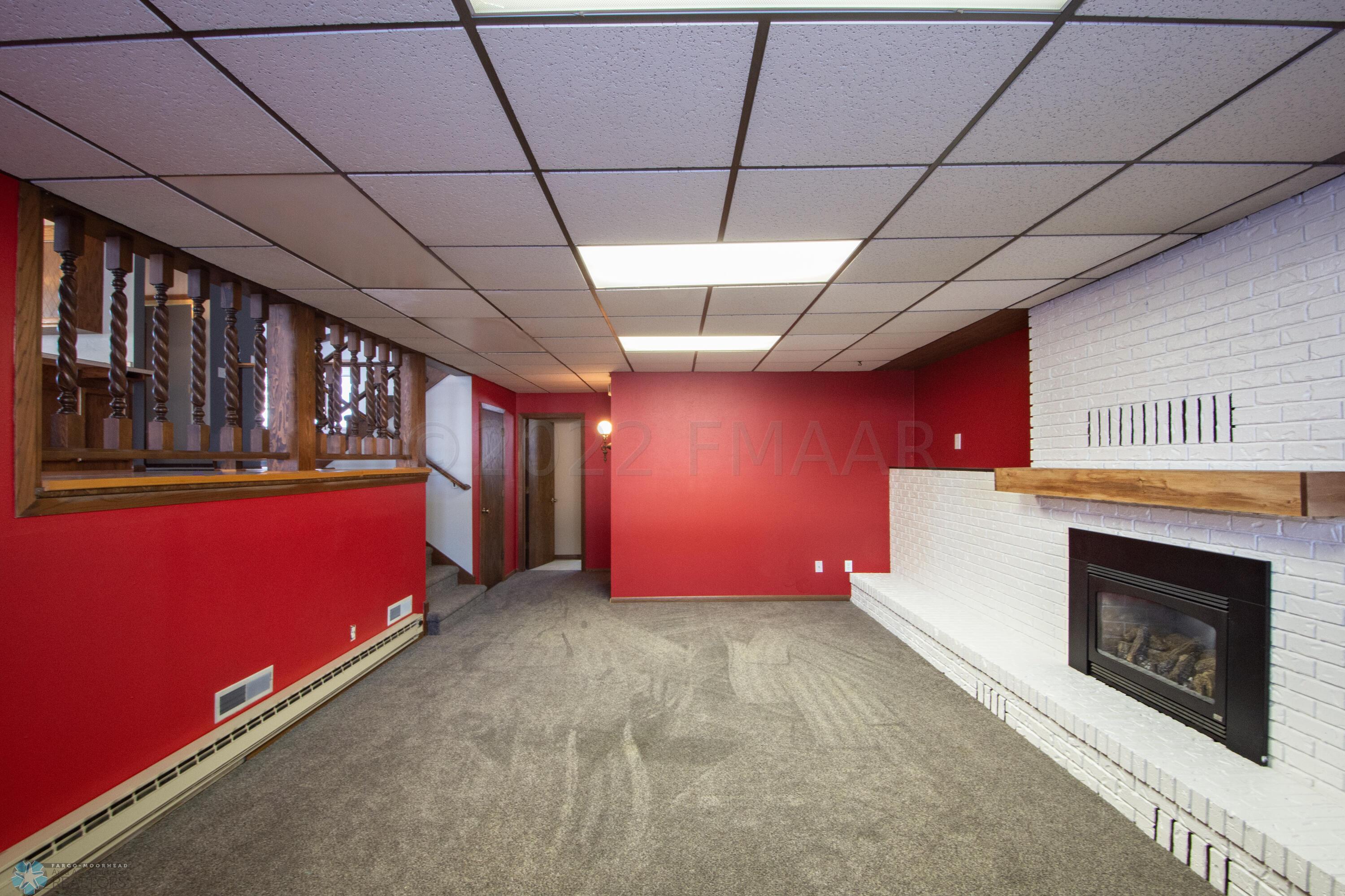lower family room with gas fireplace