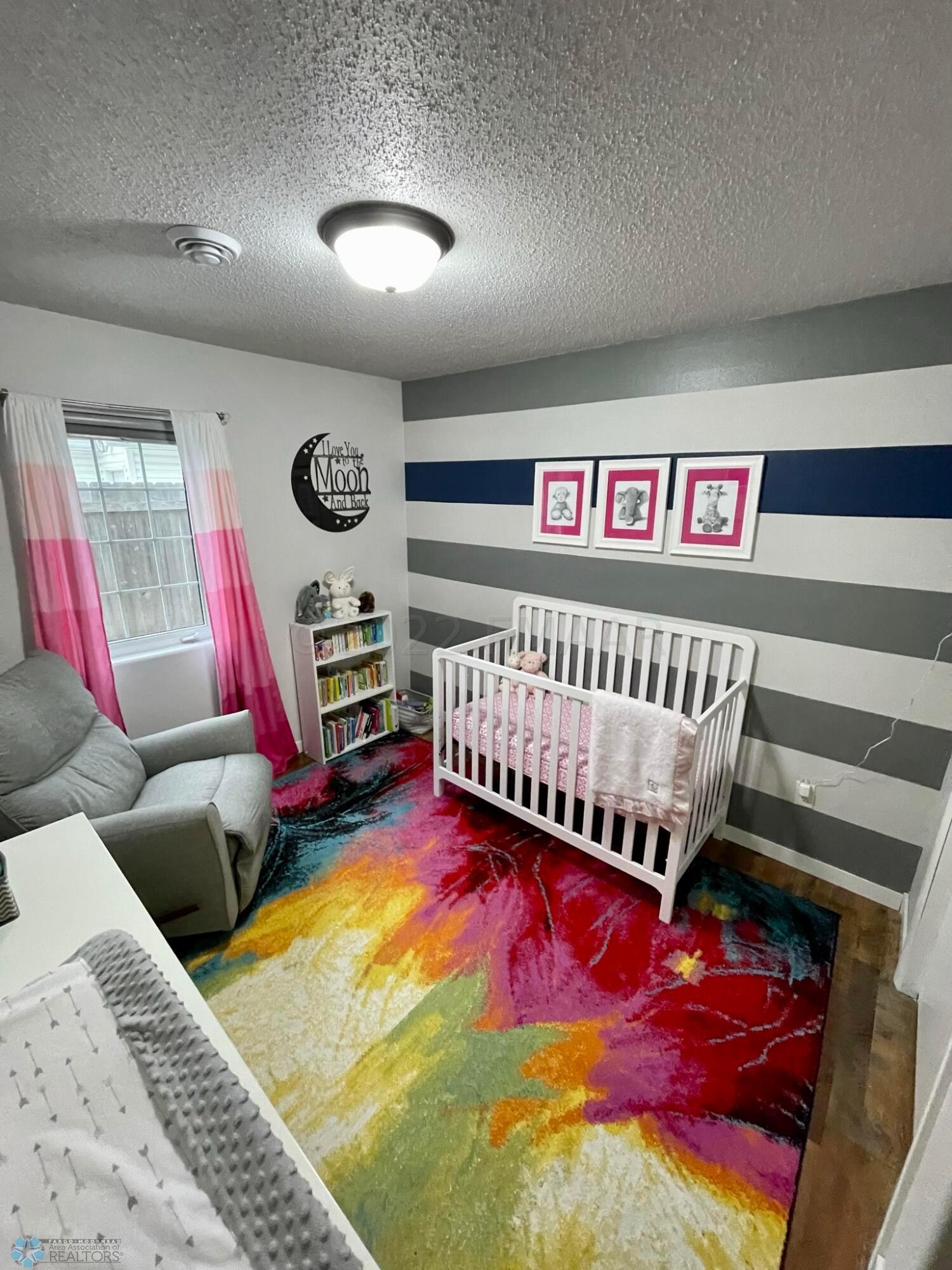Main floor secondary bedroom.
