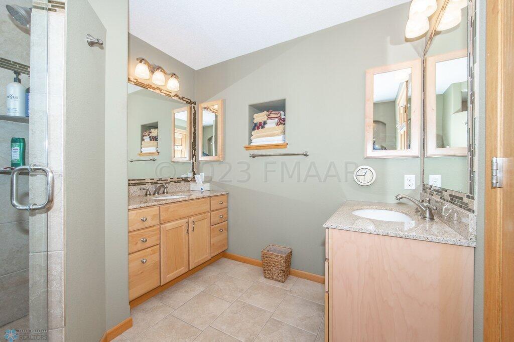 Dual vanity with heated floors