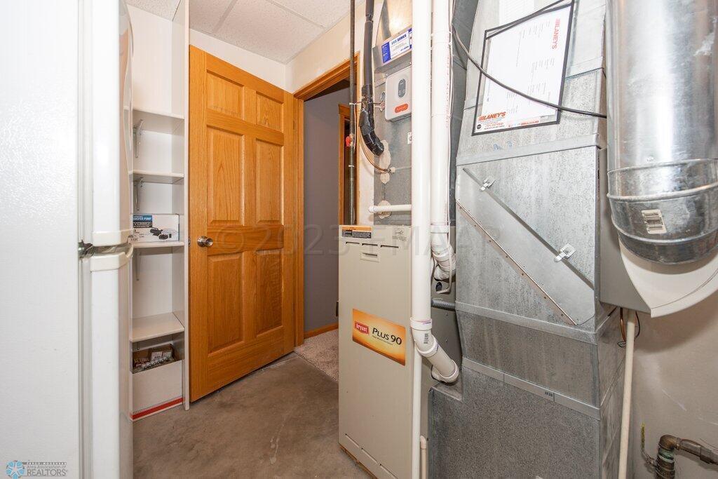Utility room with dual zone furnace