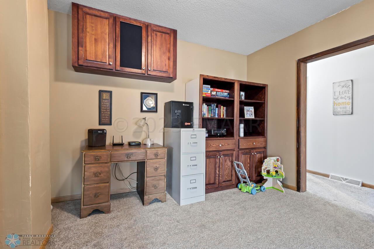 Den between dining and living rooms