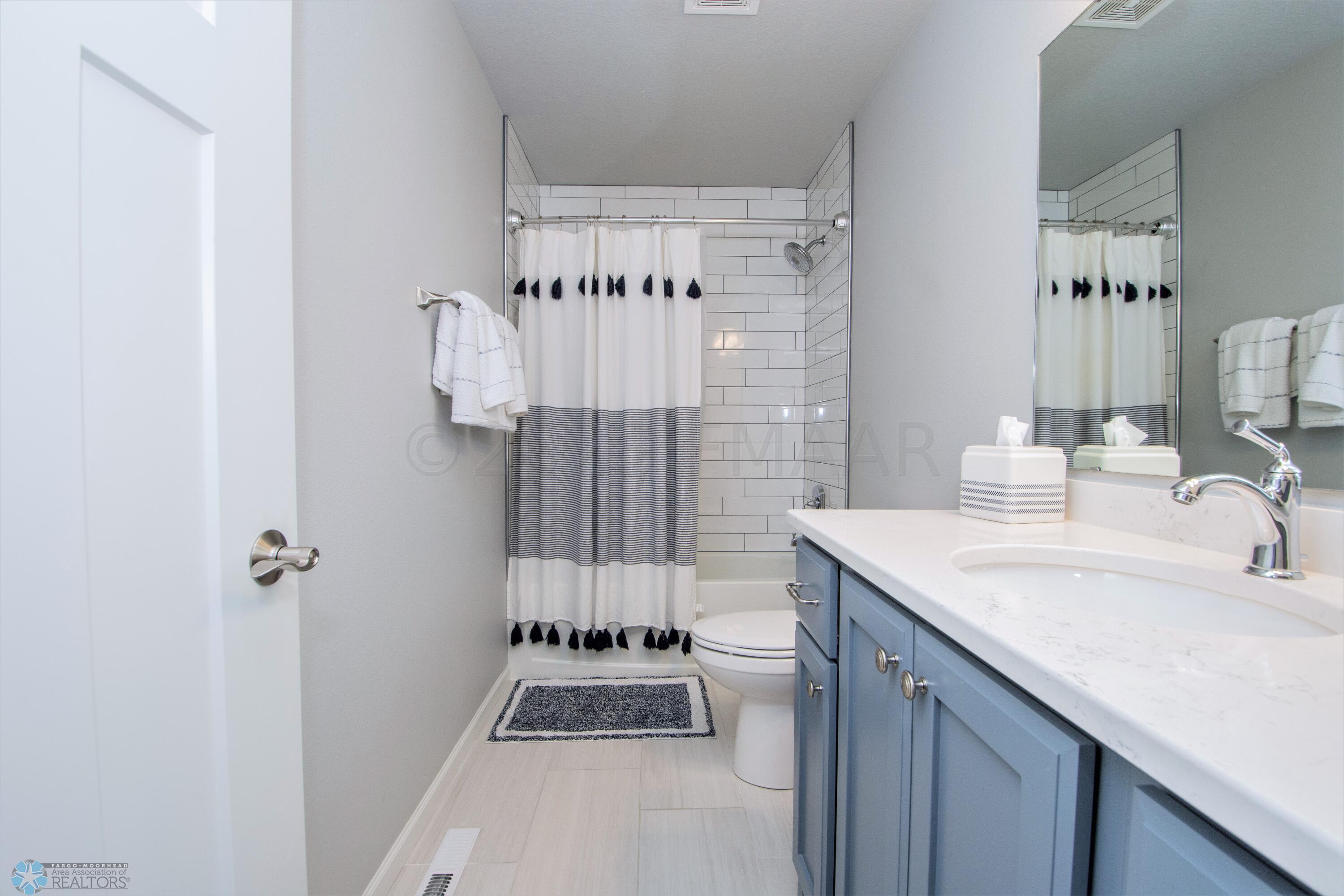 Tiled Mainfloor Bathroom