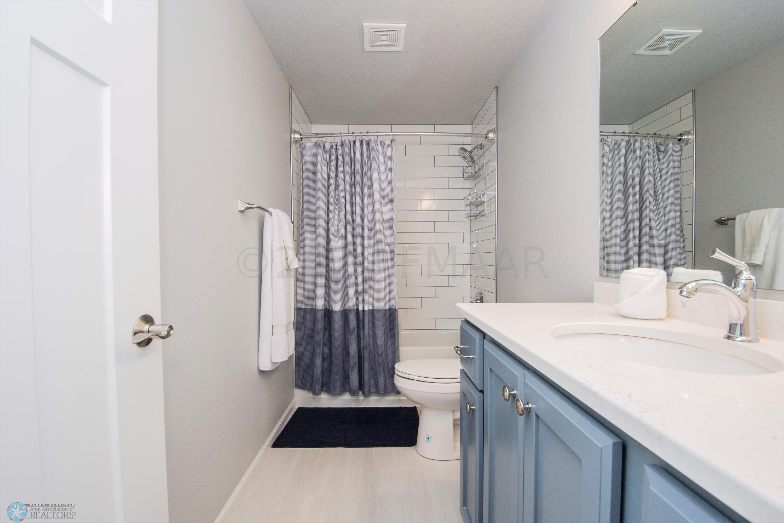 Tiled Basement Bathroom