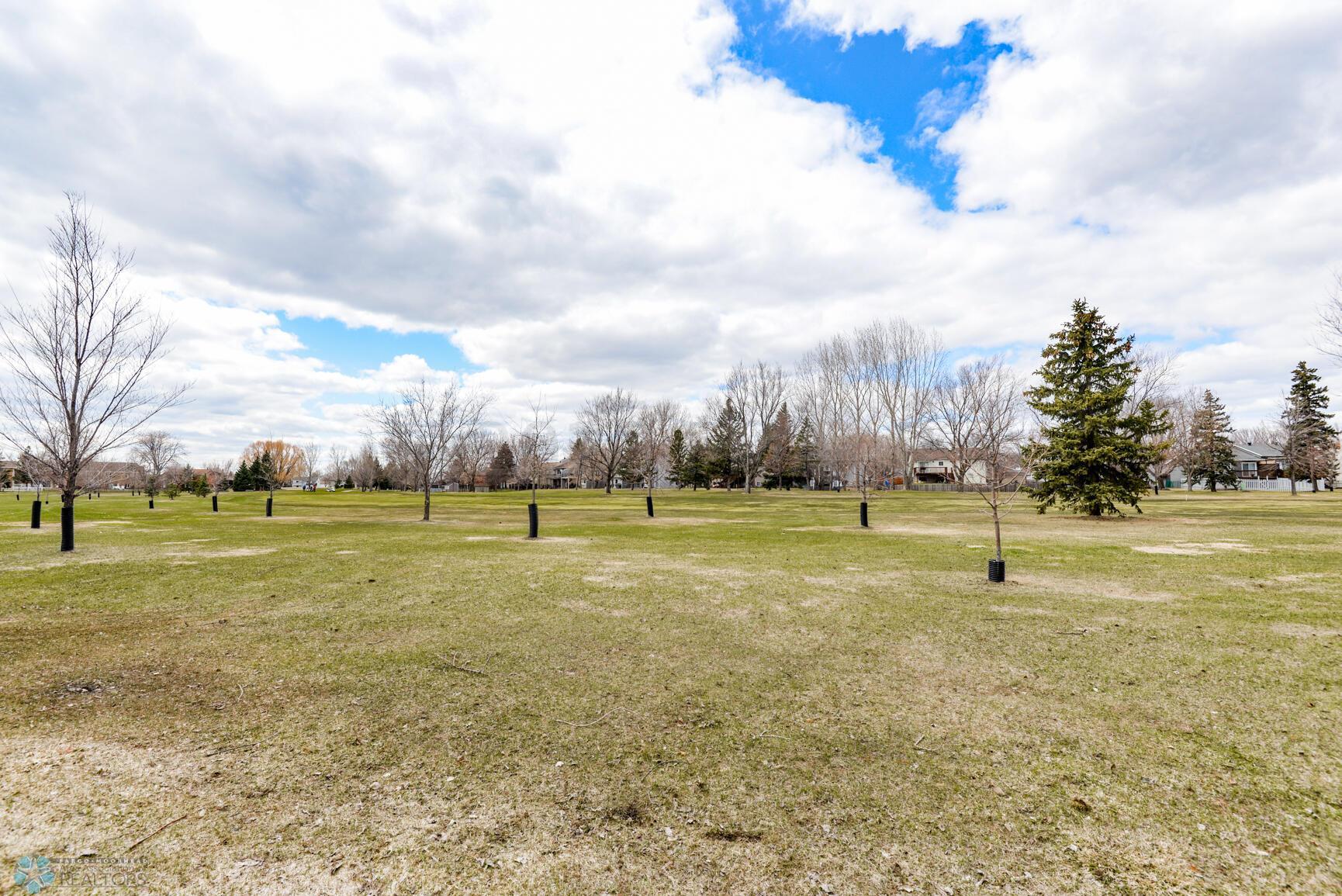 Backs to Village Green Golf Course