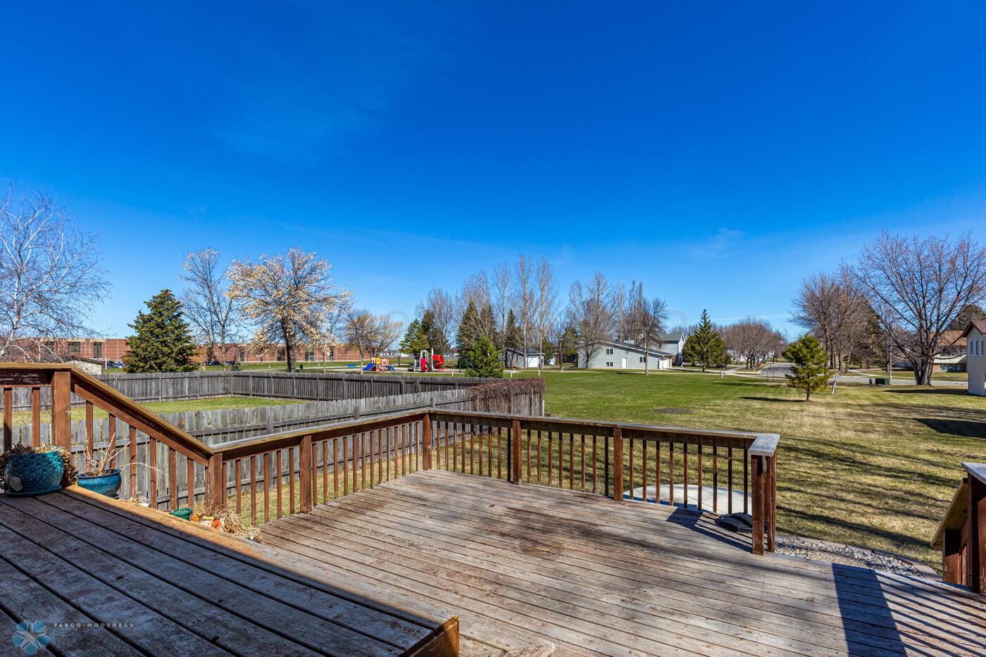 Large Deck Overlooks Park & Backyard