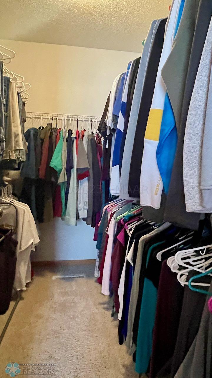 (16) Master Walk-In Closet