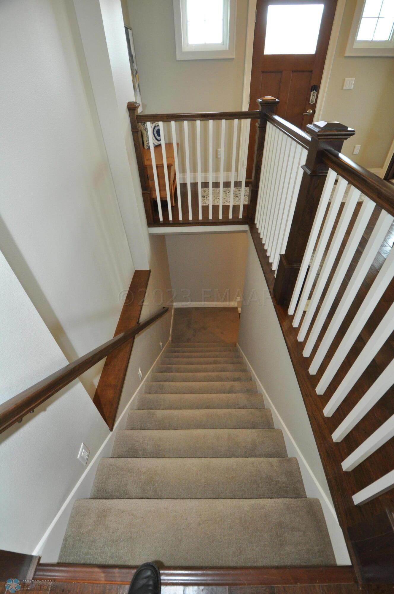 L shaped stair to lower level