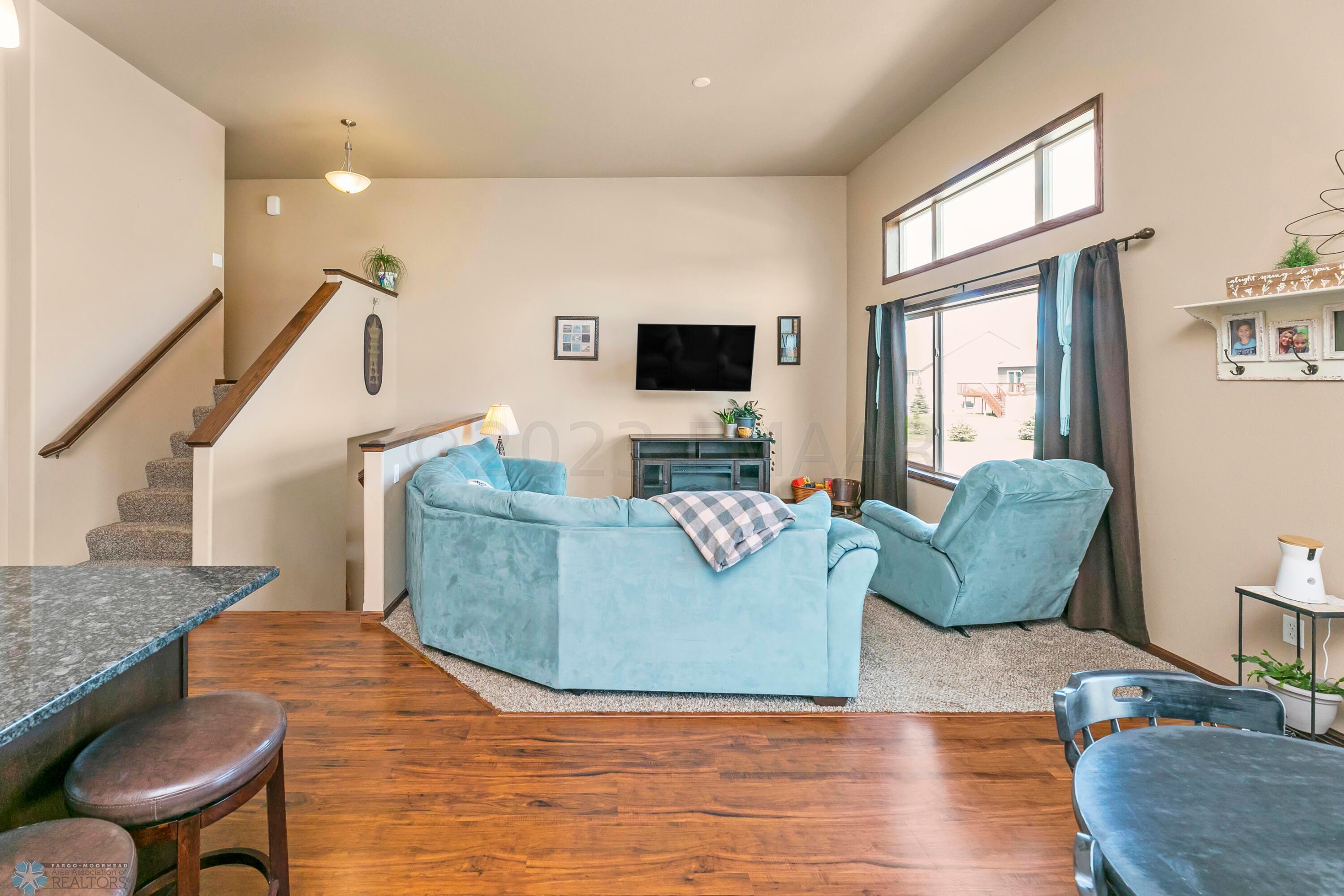 Living area with HIGH ceiling!