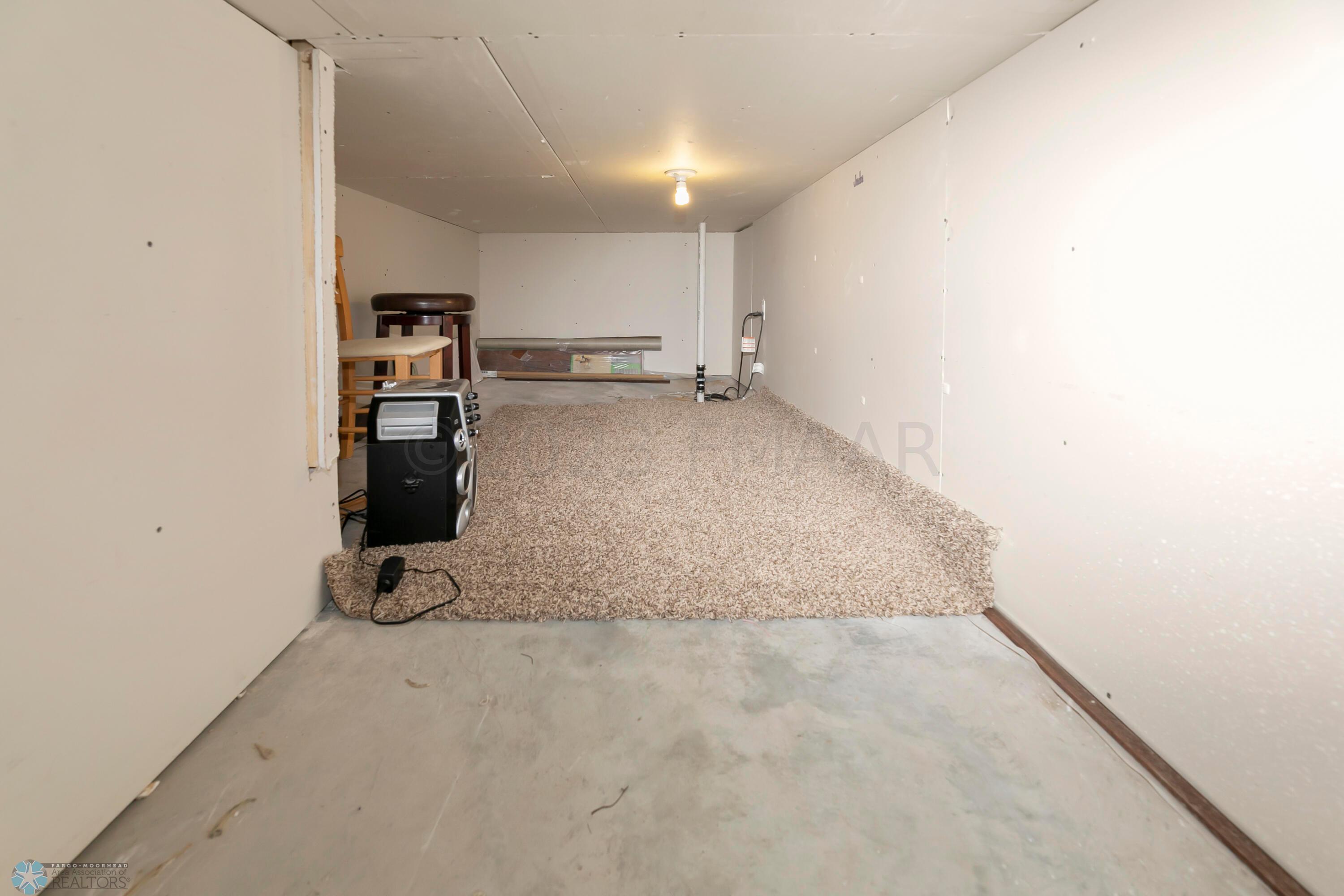 Storage area with sump pump