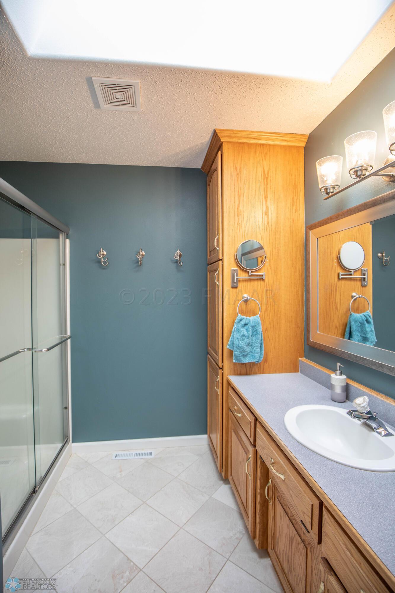 3/4 En-suite Bathroom with Skylight