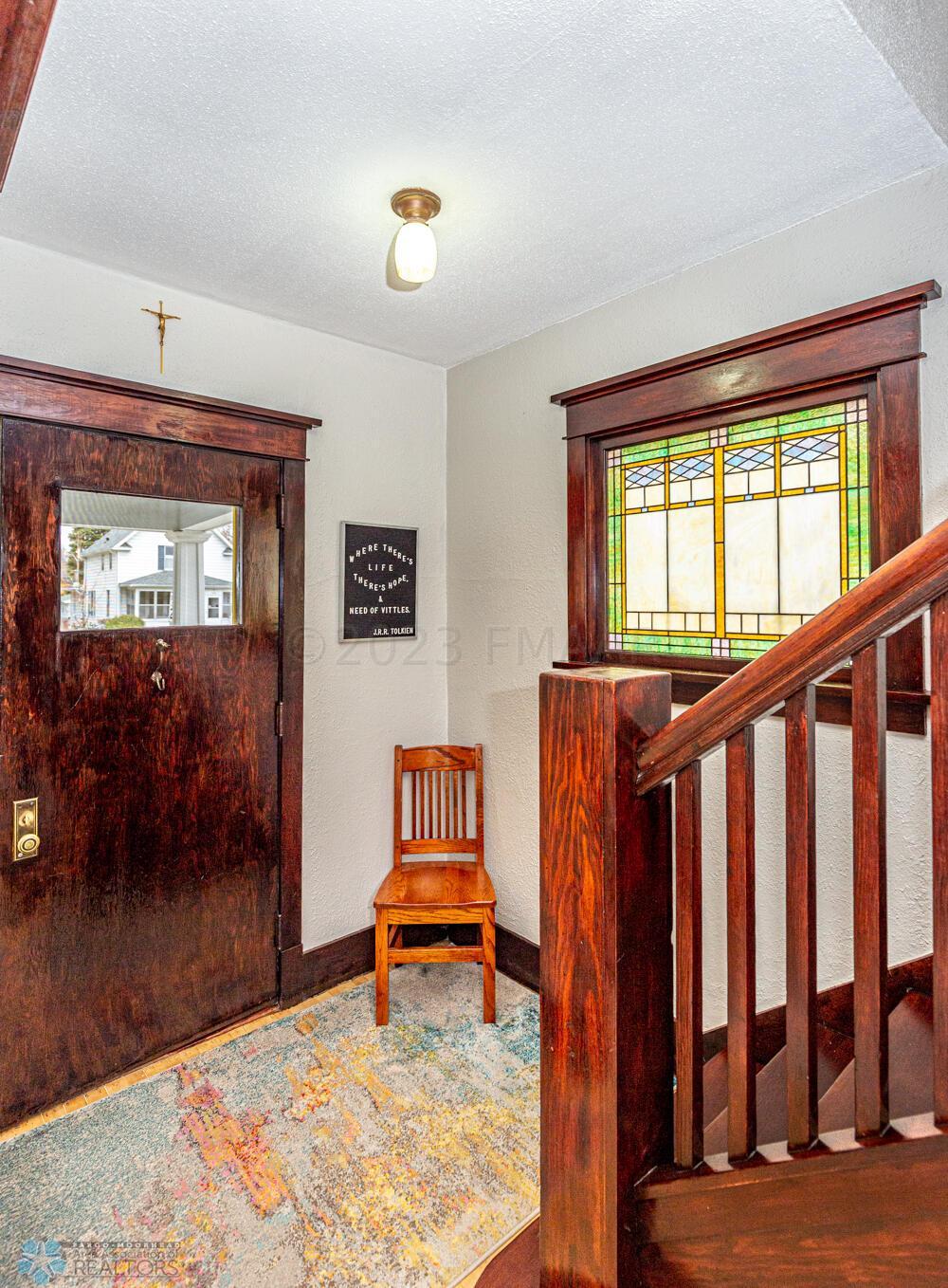 Entryway w/ stainglass window
