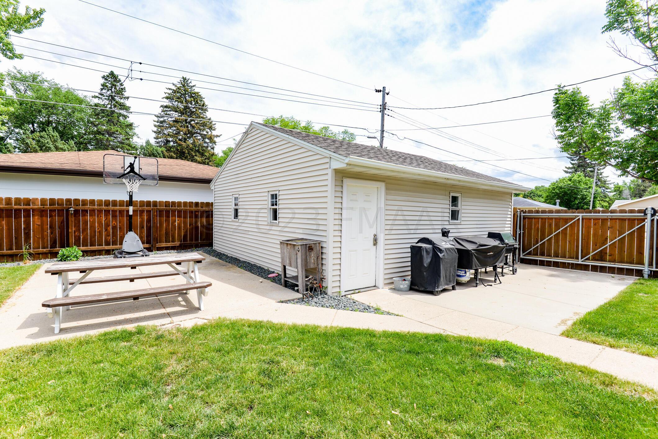 Backyard w/ Parking Pad & Sliding Gate