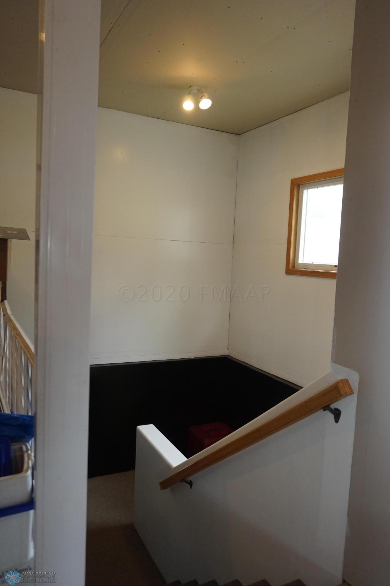 Garage entrance to basement