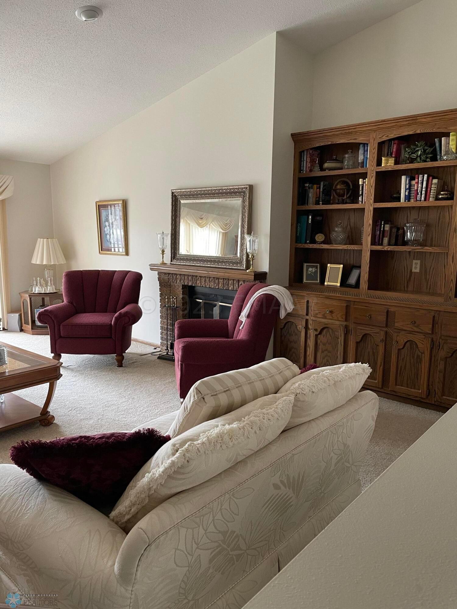 Bookcase and fireplace