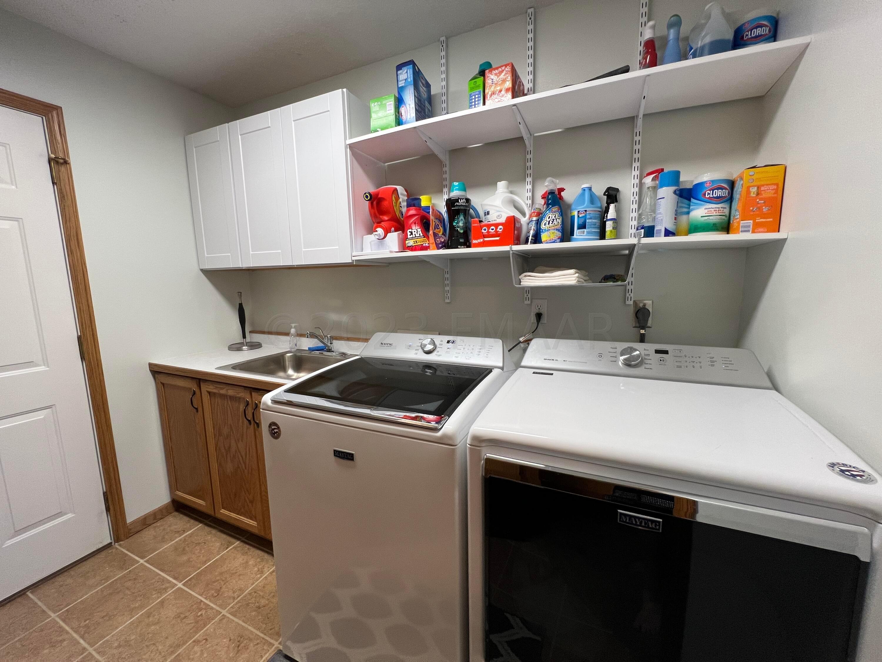 Laundry with access to garage
