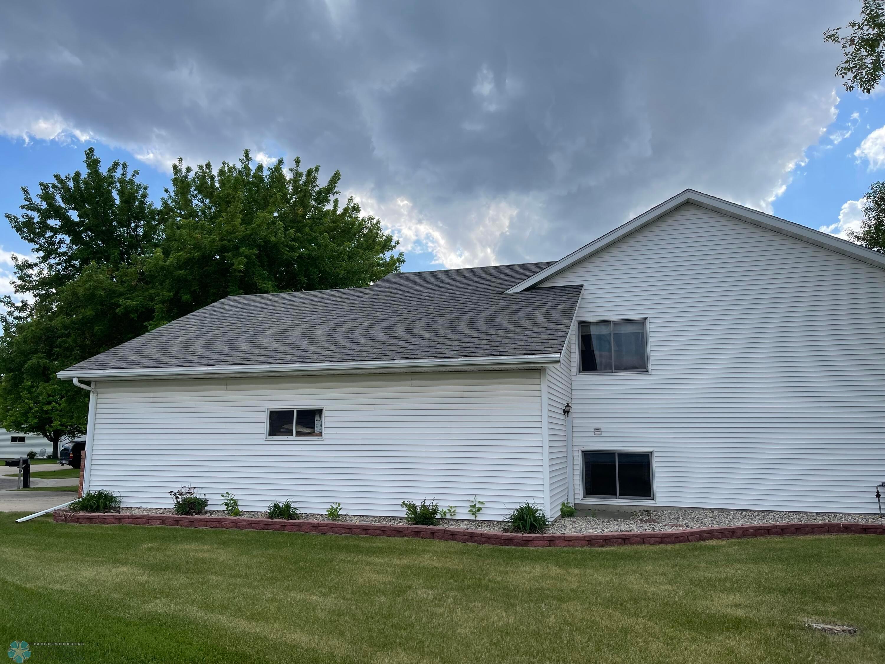 SIDE OF GARAGE/HOUSE