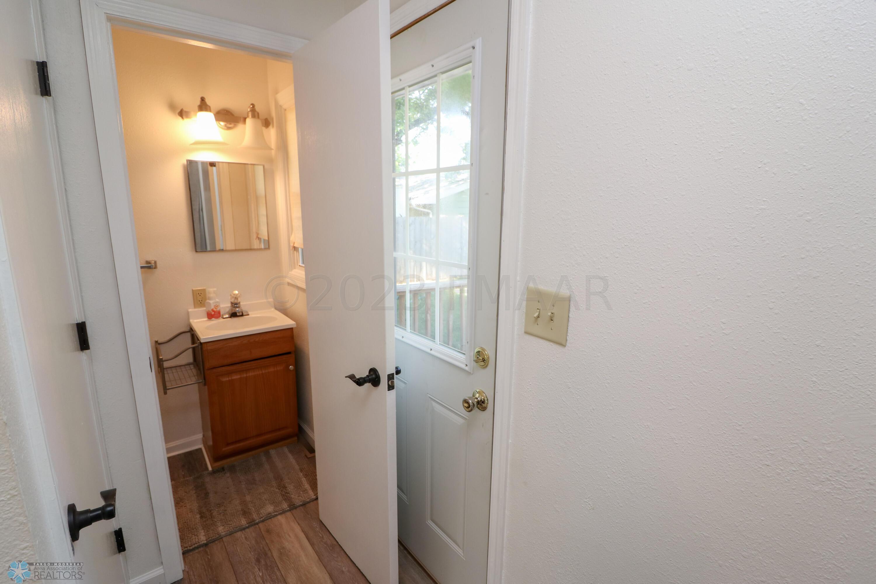 Back door and 1/2 bath