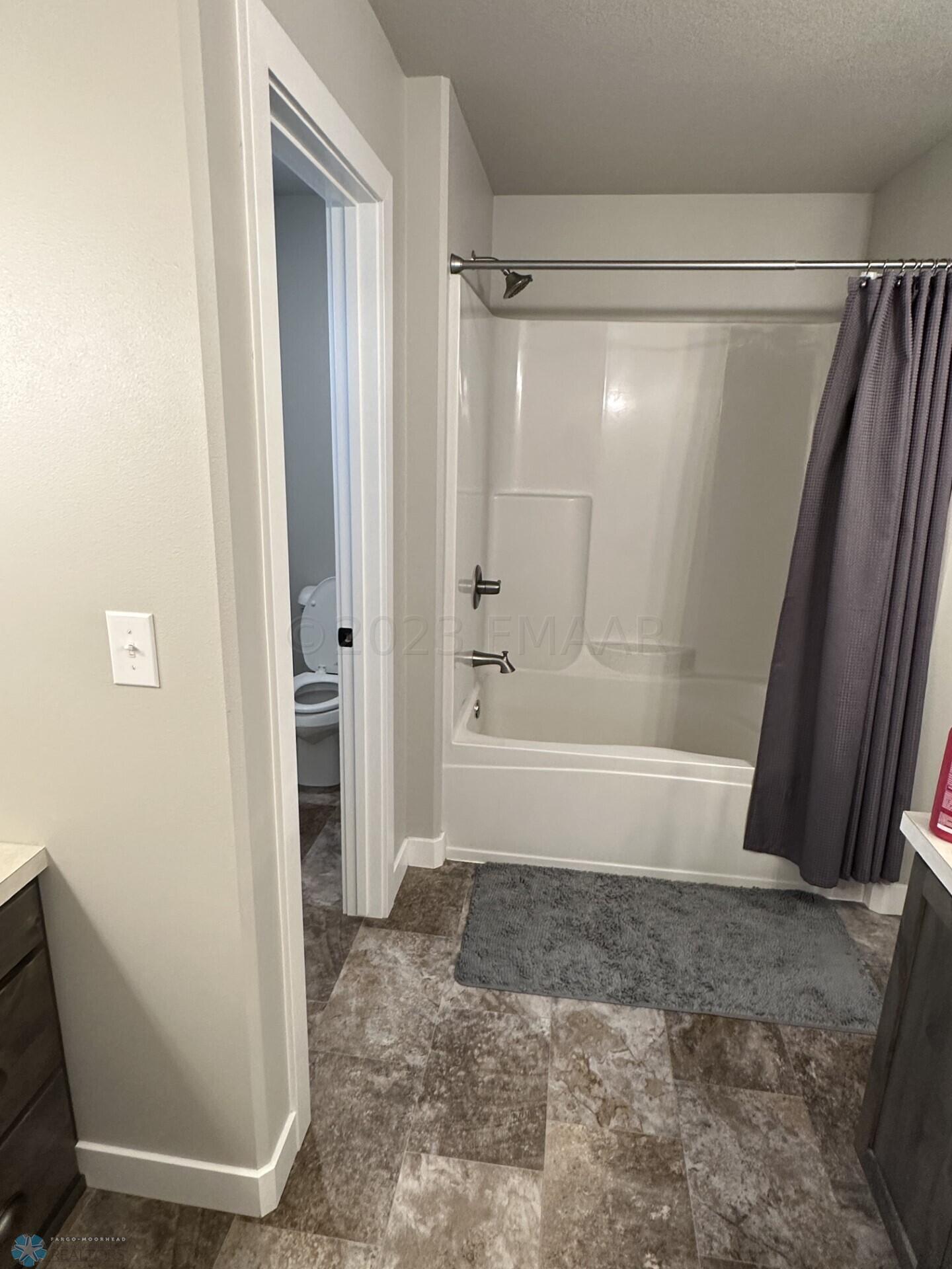 Bath w/ door to toilet room