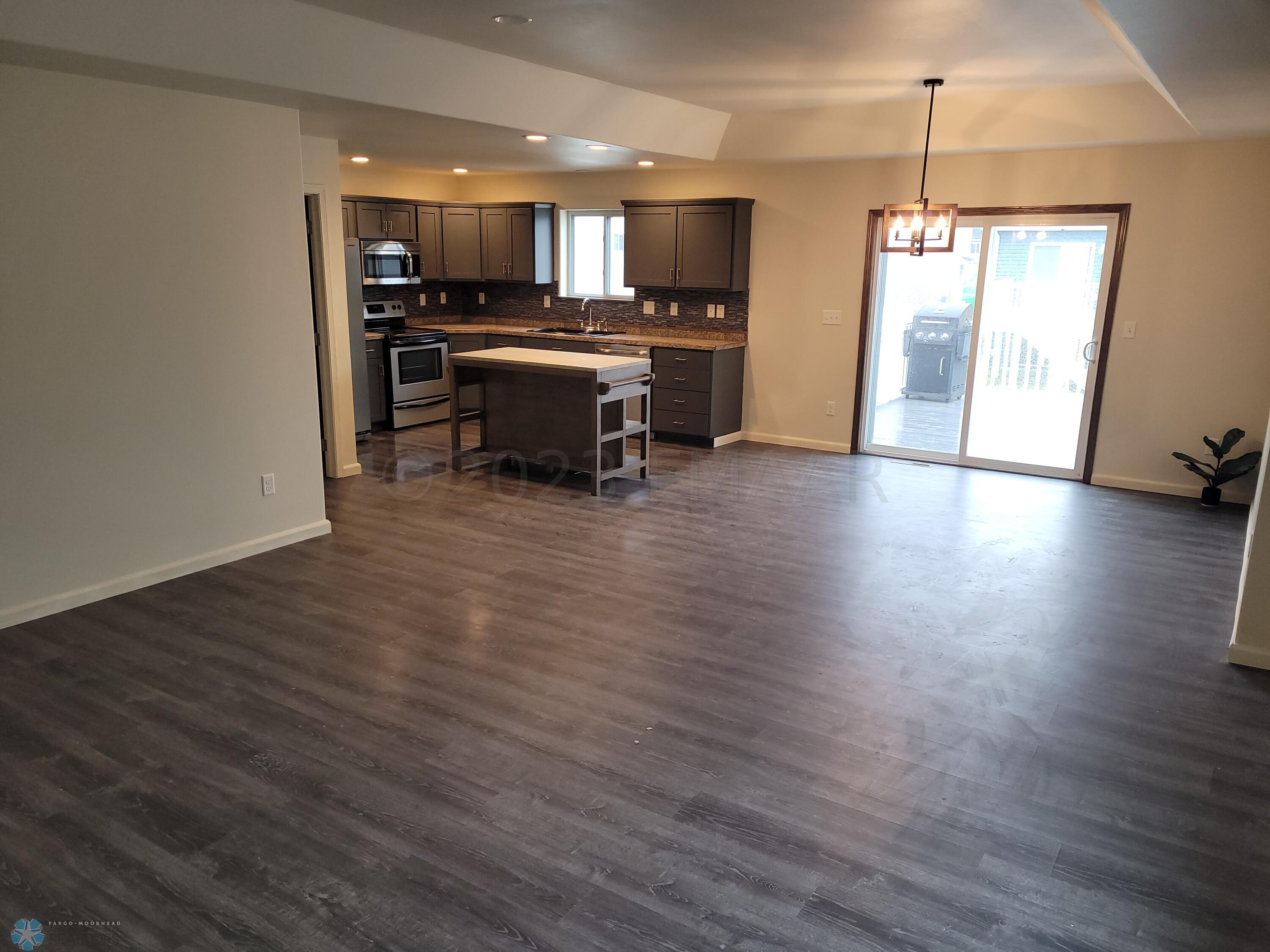 LIVING ROOM/DINING AREA/KITCHEN
